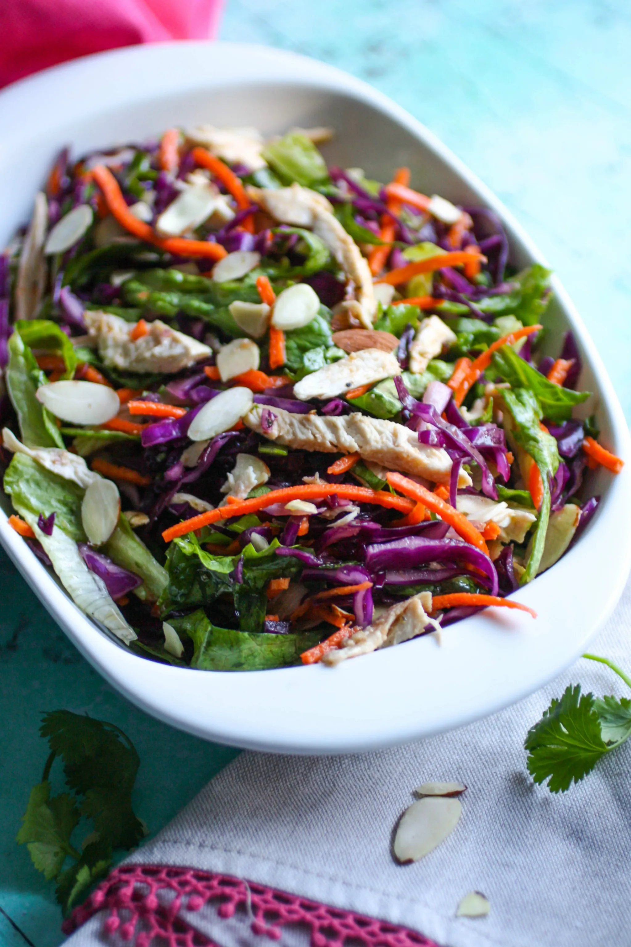 Crunchy Cabbage & Chicken Salad with Sesame Dressing is a lovely salad to serve with any meal. You'll love the crunch and color in this vibrant cabbage salad.