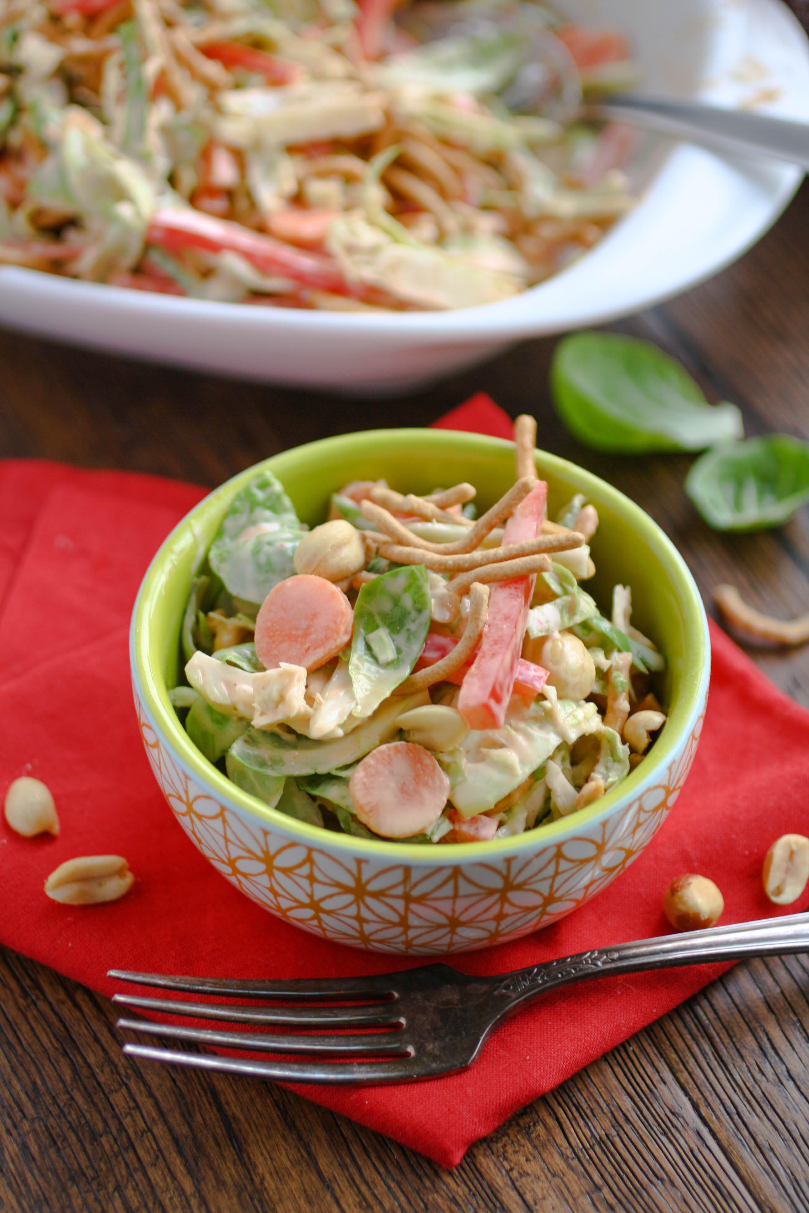 Crunchy Brussels Sprouts Salad with Creamy Sriracha Dressing is a salad full of flavor! It's perfect for Easter dinner or any other meal.