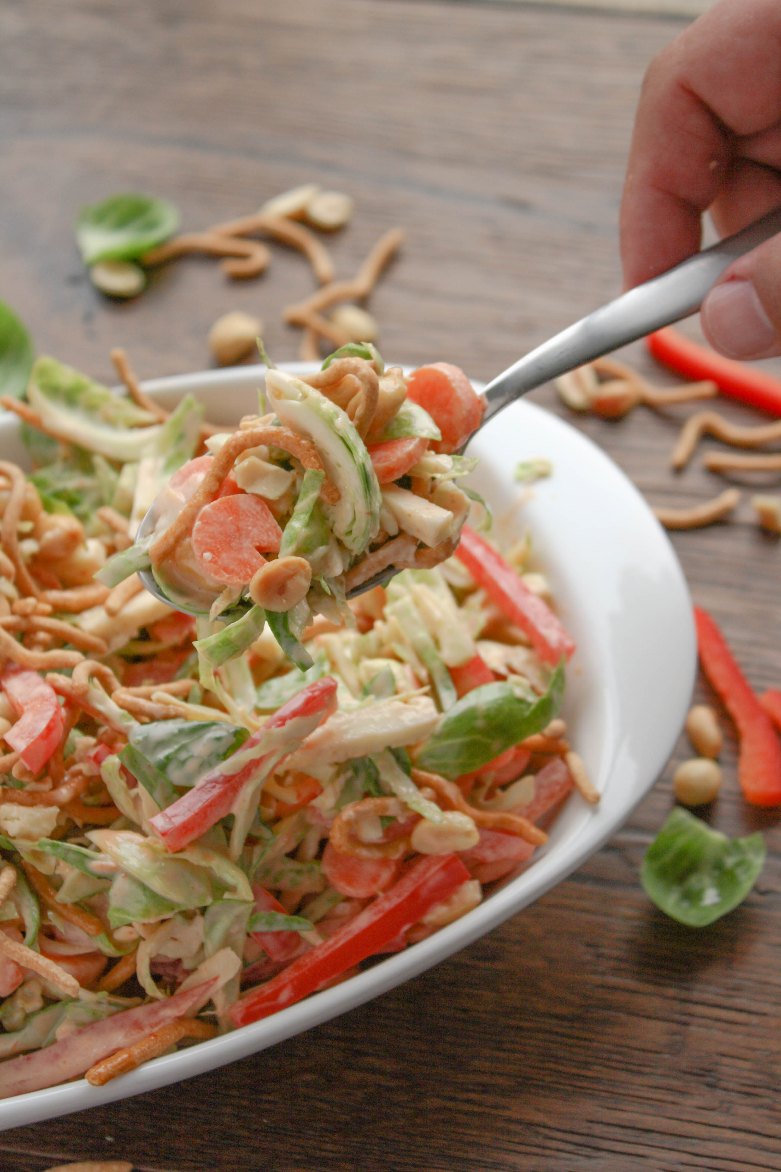 Crunchy Brussels Sprouts Salad with Creamy Sriracha Dressing is a great side for Easter dinner, or for an early spring meal. You'll love how easy it is to make!