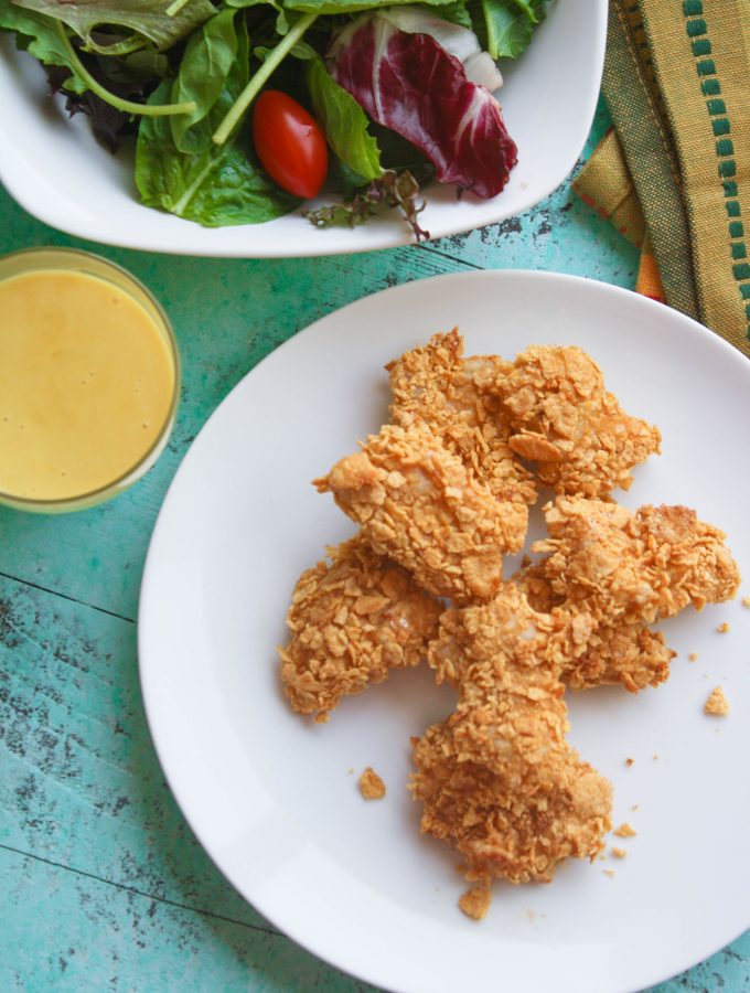 Crunchy Oven Baked Chicken Nuggets with Honey Mustard Sauce makes a fun meal. Try them for dinner soon!