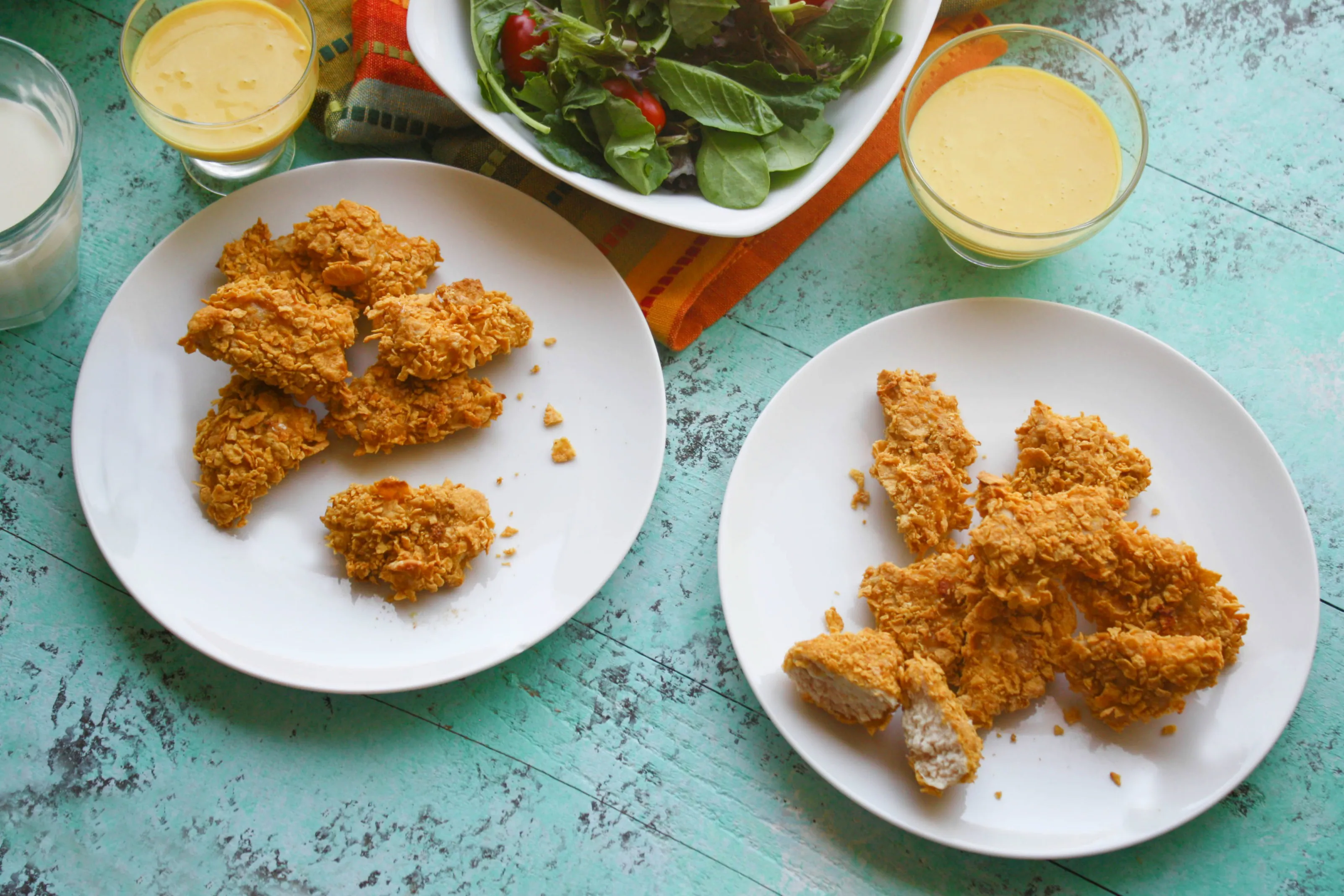 Crunchy Oven Baked Chicken Nuggets with Honey Mustard Sauce are perfect for kids of all ages! Everyone will love this chicken dish for dinner!
