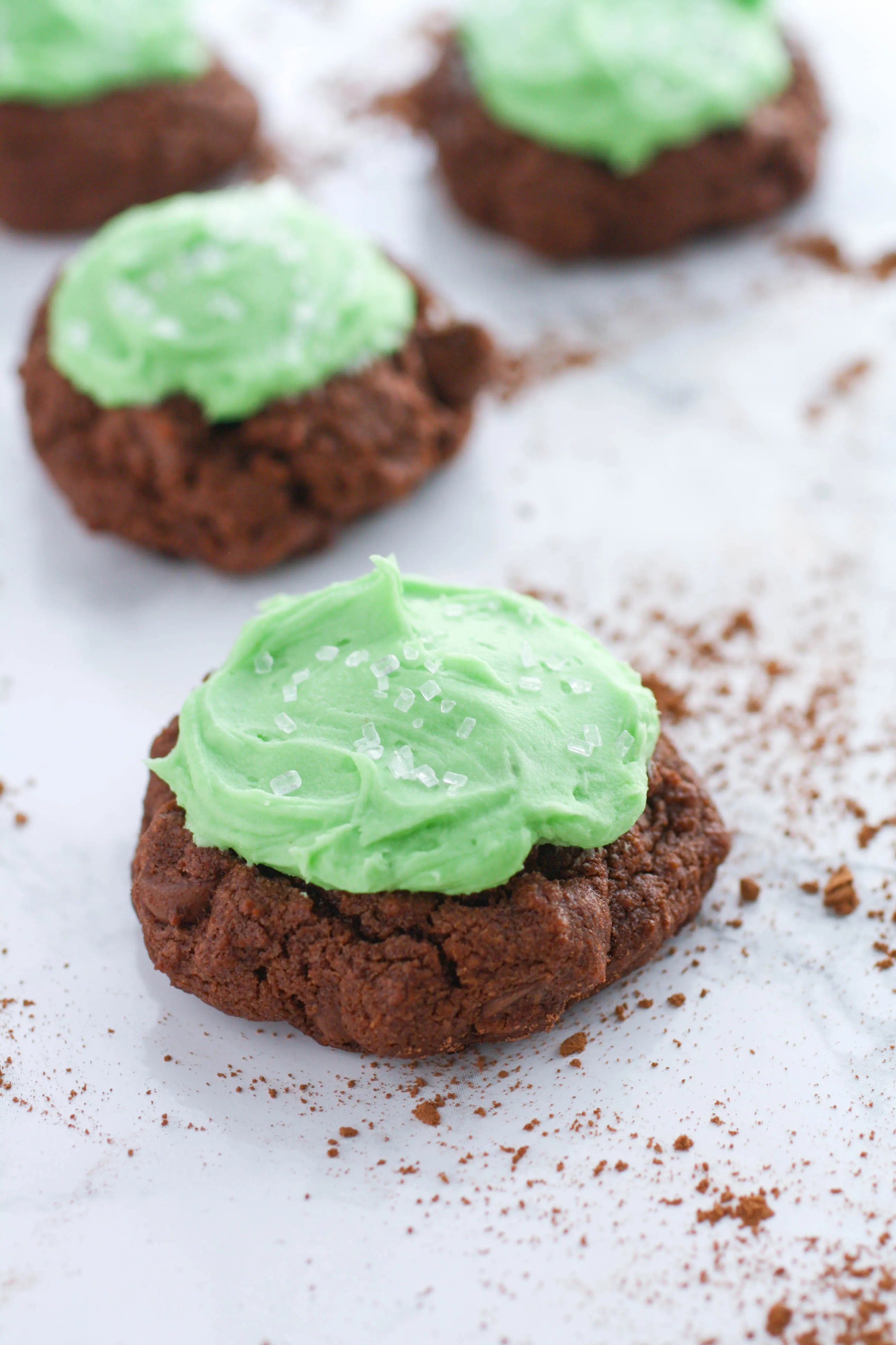 Double Chocolate Cookies with Baileys Buttercream Frosting make a fun and tasty treat! You'll love Double Chocolate Cookies with Baileys Buttercream Frosting for St. Patrick's Day fun!