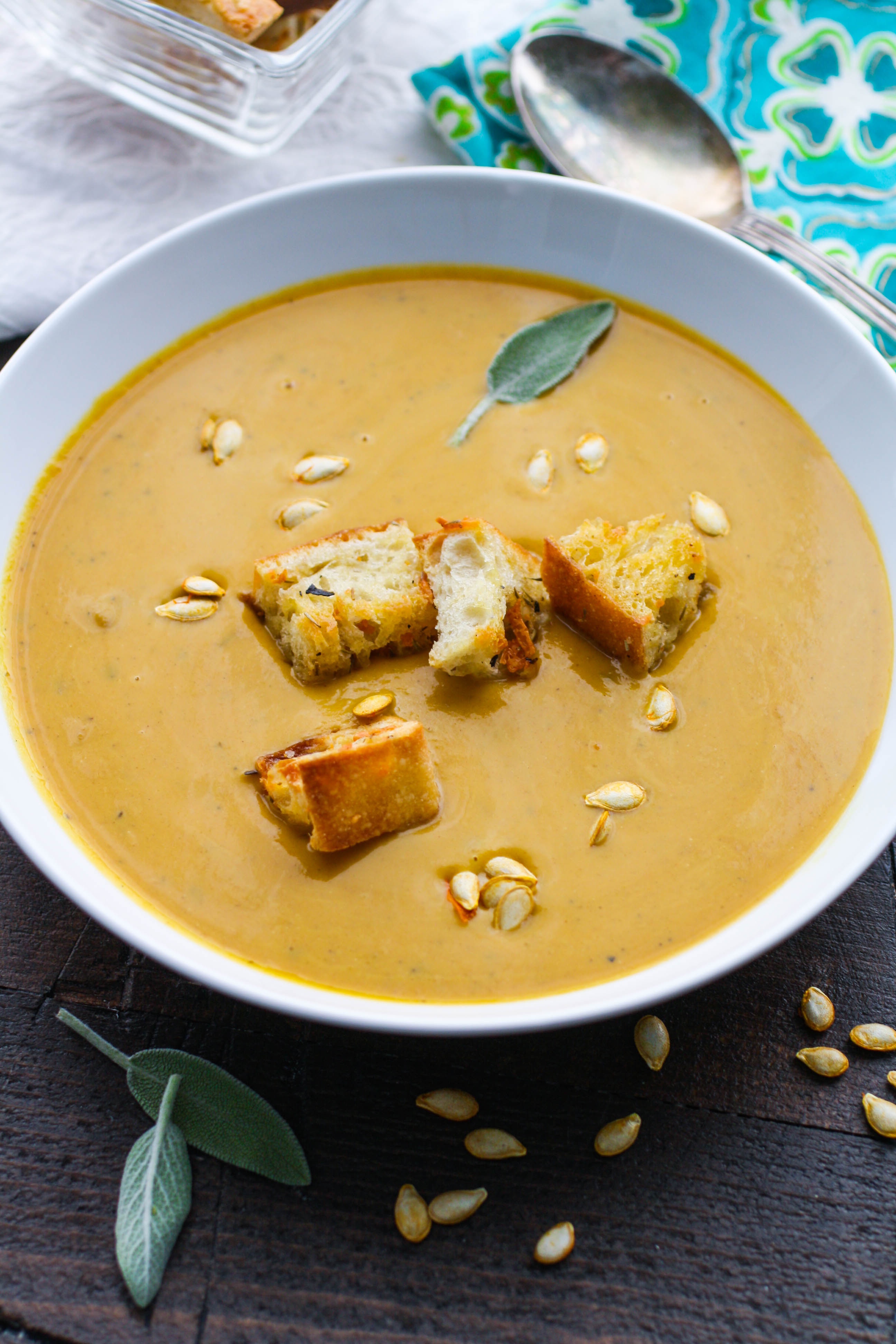 Easy, Creamy Butternut Squash Soup is one you'll want to serve all winter. The colors and flavors of this soup are lovely!