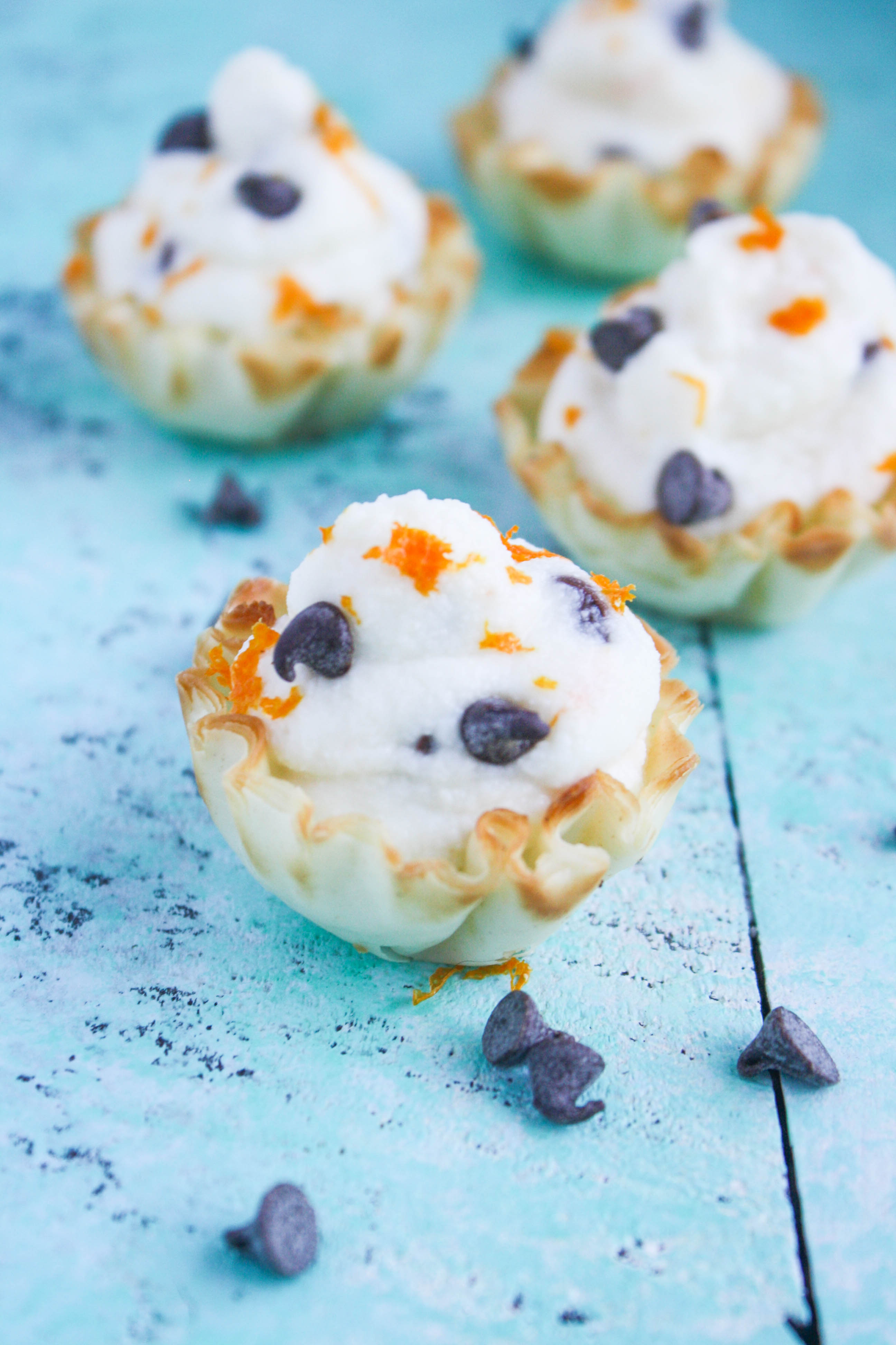 Easy Chocolate Chip-Orange Cannoli Cups are a tasty treat for a special occasion. These cannoli cups are fun and delicious for any party!