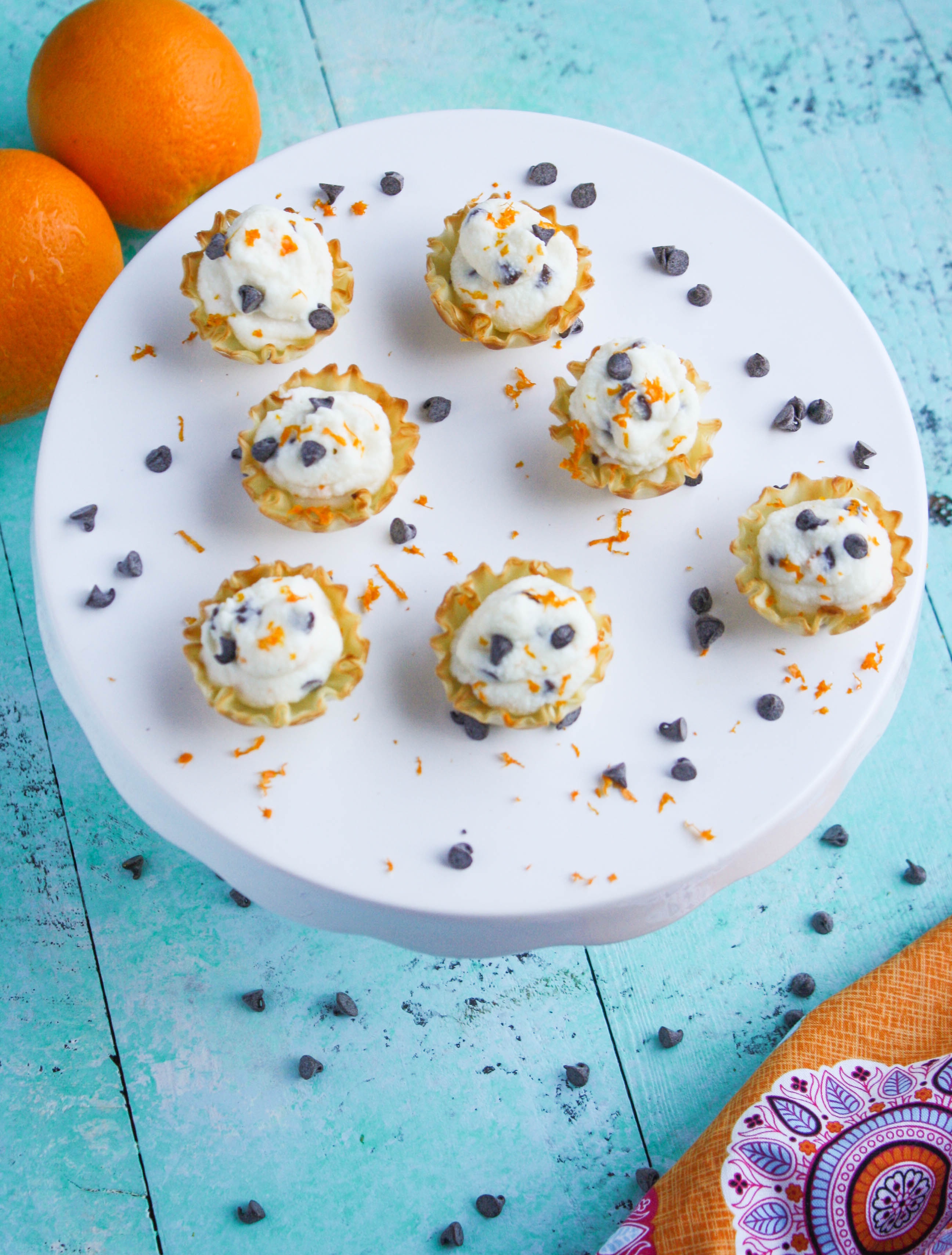 Easy Chocolate Chip-Orange Cannoli Cups are a fabulous treat and so easy to make, too! You'll love these cannoli cups for a special treat!