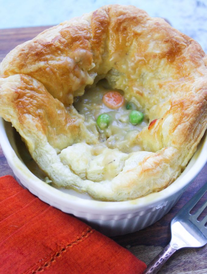Easy Puffy Pastry Vegetable Pot Pies are pure comfort food. You'll love that these puff pastry vegetarian pot pies are so easy to make!