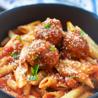 Easy homemade meatballs piled on your favorite pasta makes a hearty, classic meal.