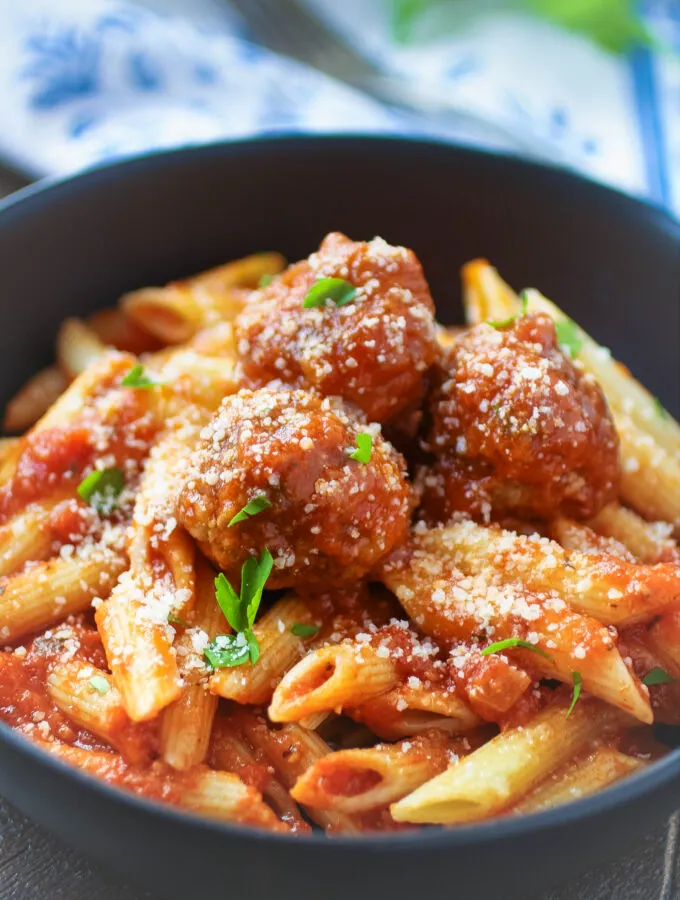 Easy homemade meatballs piled on your favorite pasta makes a hearty, classic meal.