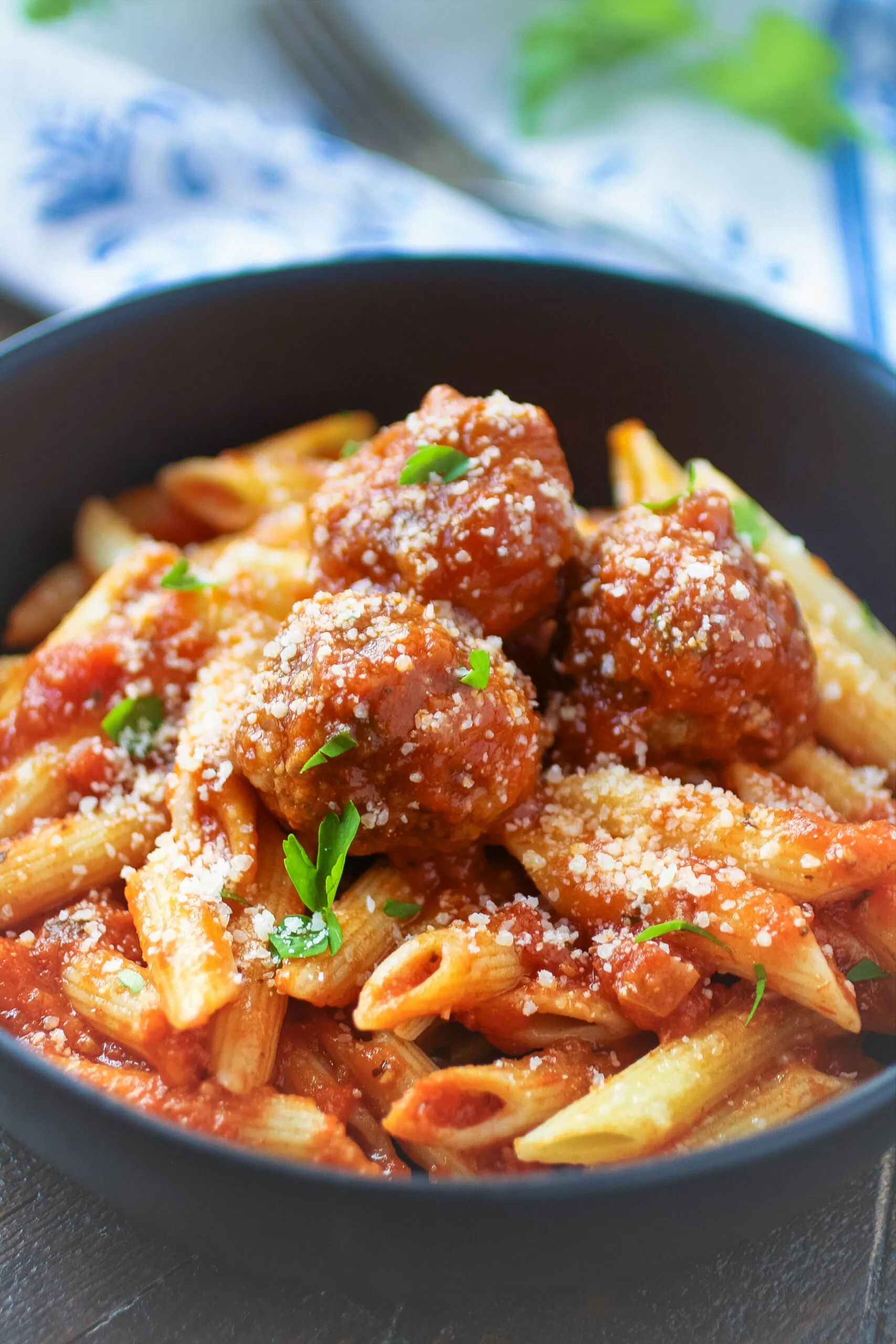 Easy homemade meatballs piled on your favorite pasta make a hearty, classic meal.