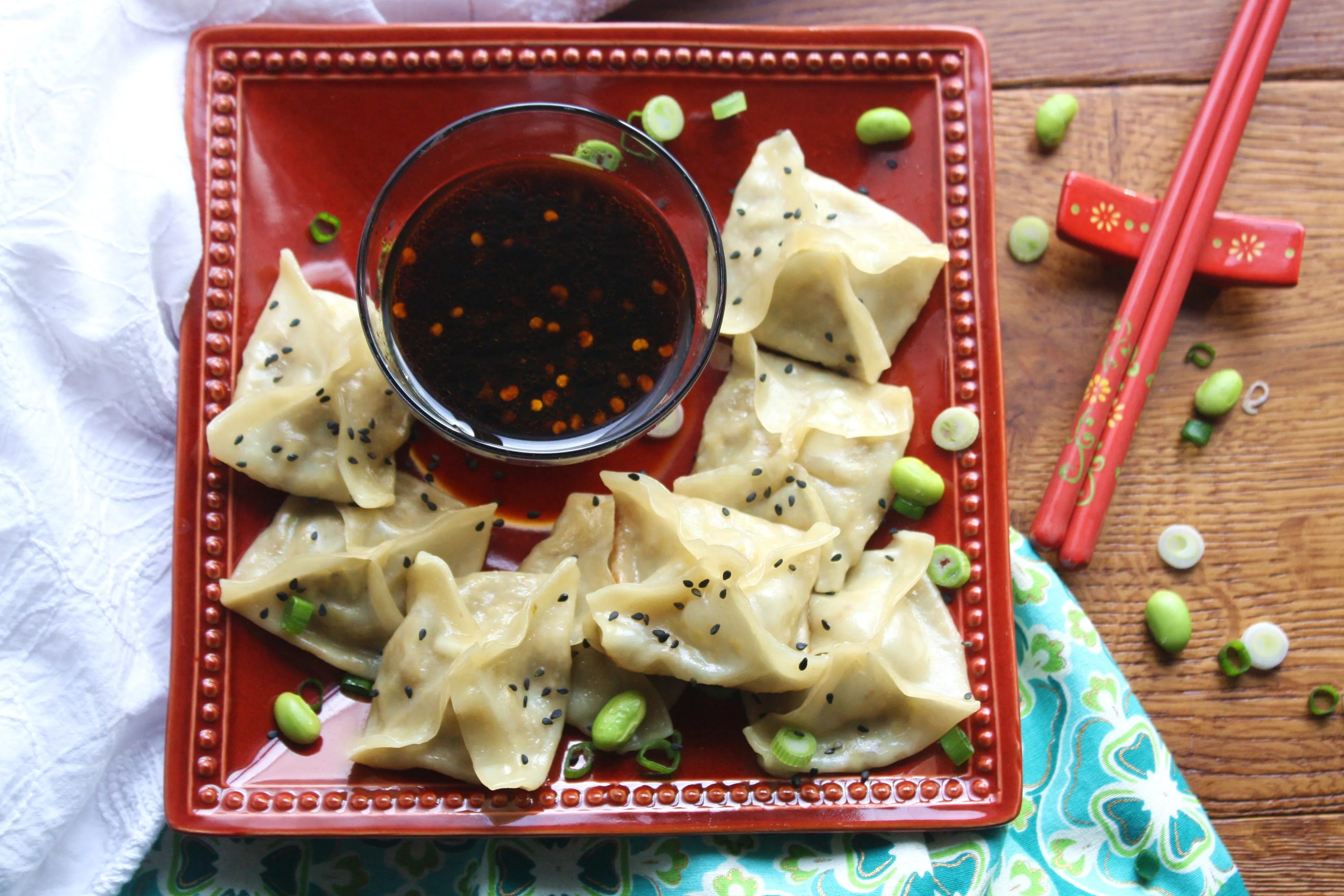 Edamame and Mushroom Potstickers with Dipping Sauce make a yummy snack. You'll love these potstickers with they're tasty dipping sauce!