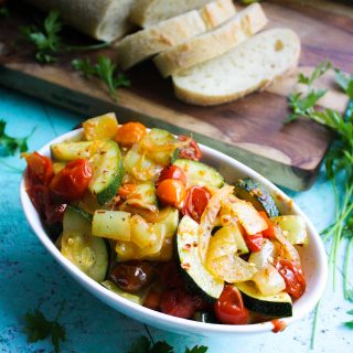 Farmers Market Find: Sautéed Peppers, Tomatoes & Zucchini is a simple, seasonal side dish you'll love. Farmers Market Find: Sautéed Peppers, Tomatoes & Zucchini is a tasty dish for the summer.