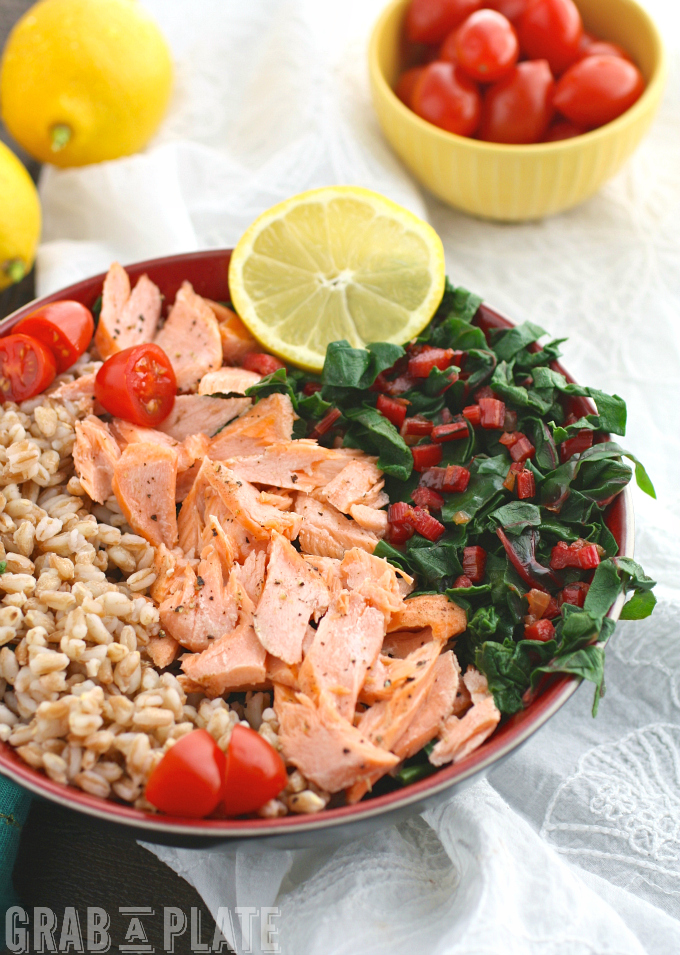 Indulge in a healthy, tasty bowl meal like Warm Farro, Salmon & Swiss Chard Bowls with Lemon Vinaigrette