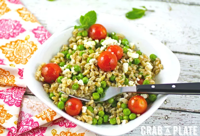 Dig in to a bowl of Farro and Pea Salad with Lemon-Mint Vinaigrette
