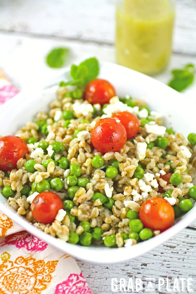 A bowl of Farro and Pea Salad with Lemon-Mint Vinaigrette has "spring" written all over it!