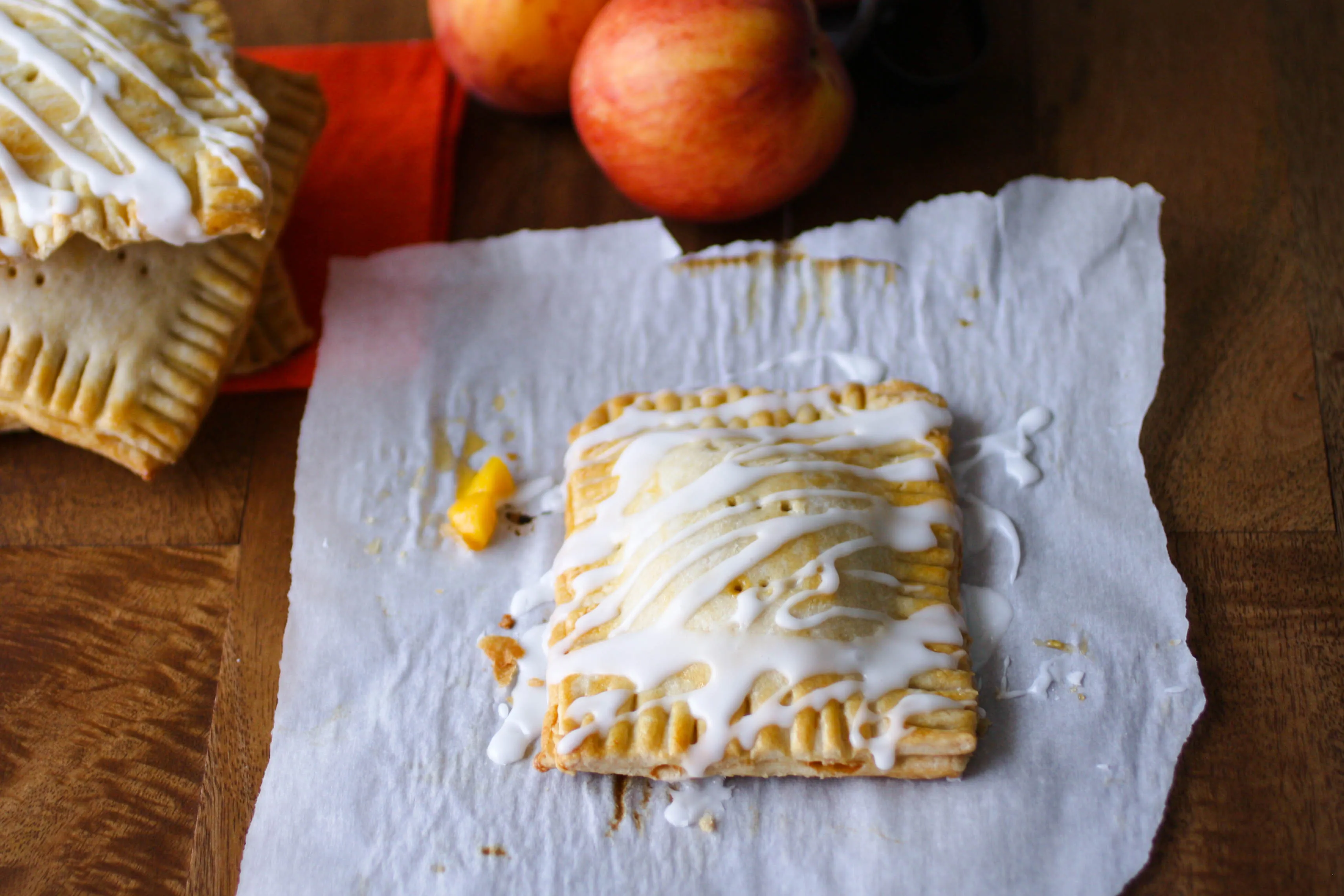Fresh Peach Pie “Pop Tarts” are flaky on the outside, and filled with fresh peaches. You'll love them!