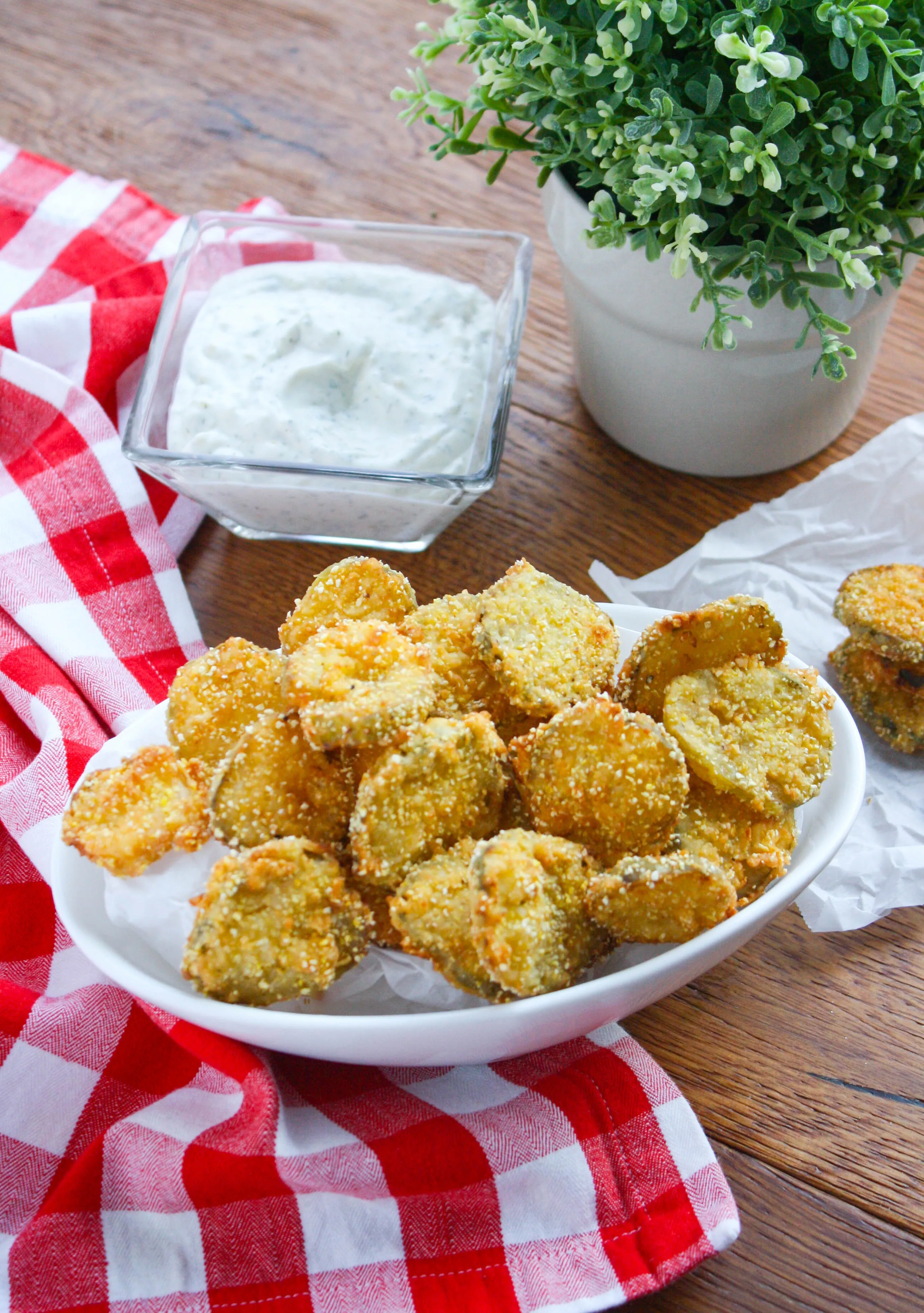 Fried Pickles with Homemade Buttermilk Ranch Dressing are the perfect snack to much on at any gathering. You'll love these pickles as a snack on the weekend!