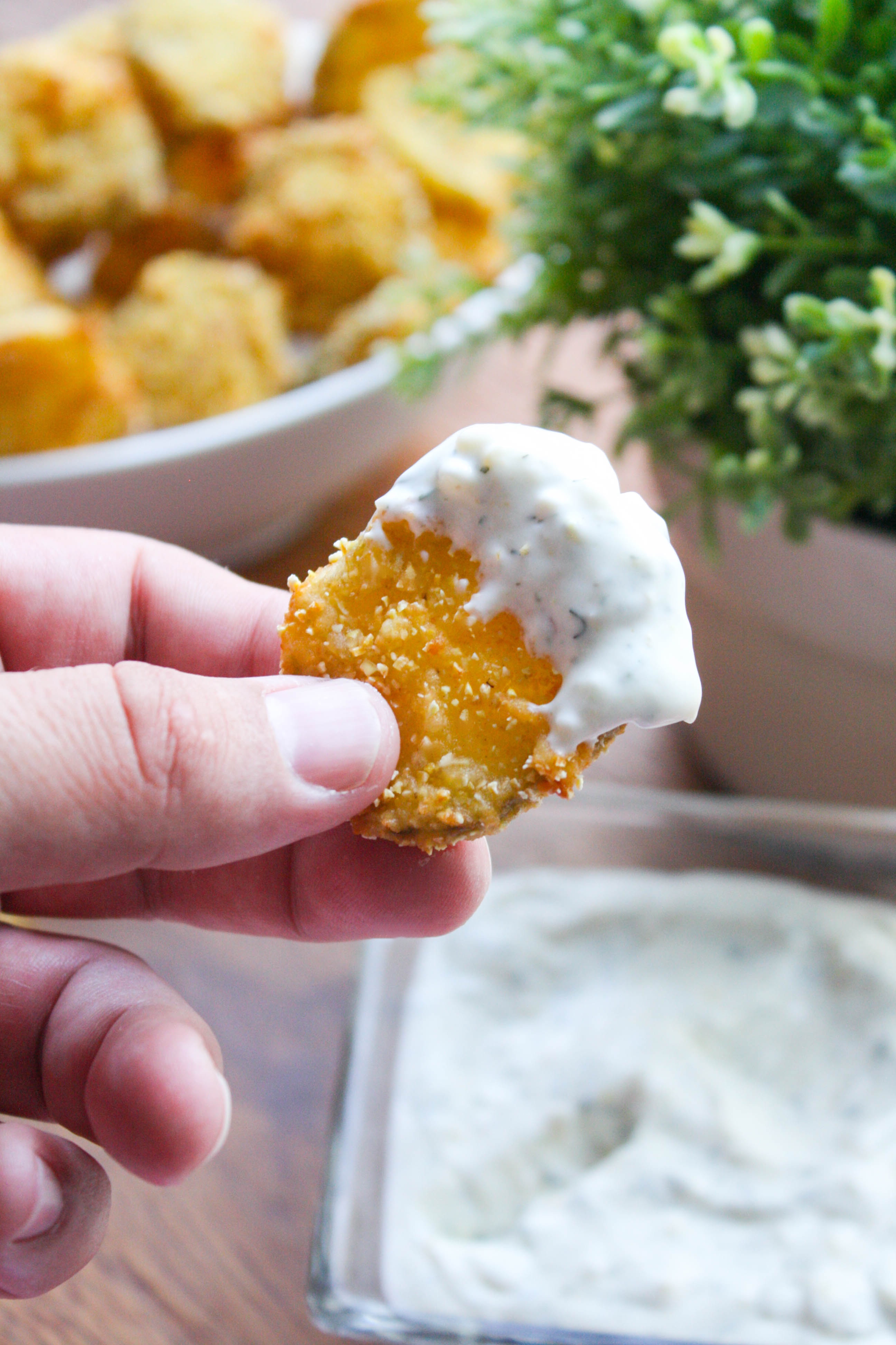 Fried Pickles with Homemade Buttermilk Ranch Dressing make a fabulous anytime snack! You'll love the fried pickles dunked into the tasty dip -- the perfect snack!