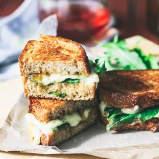 Grilled Brie, Fig Jam, and Dandelion Greens Sandwiches are delicious sandwiches for your next meal. Grilled Brie, Fig Jam, and Dandelion Greens Sandwiches make a unique and tasty meal.