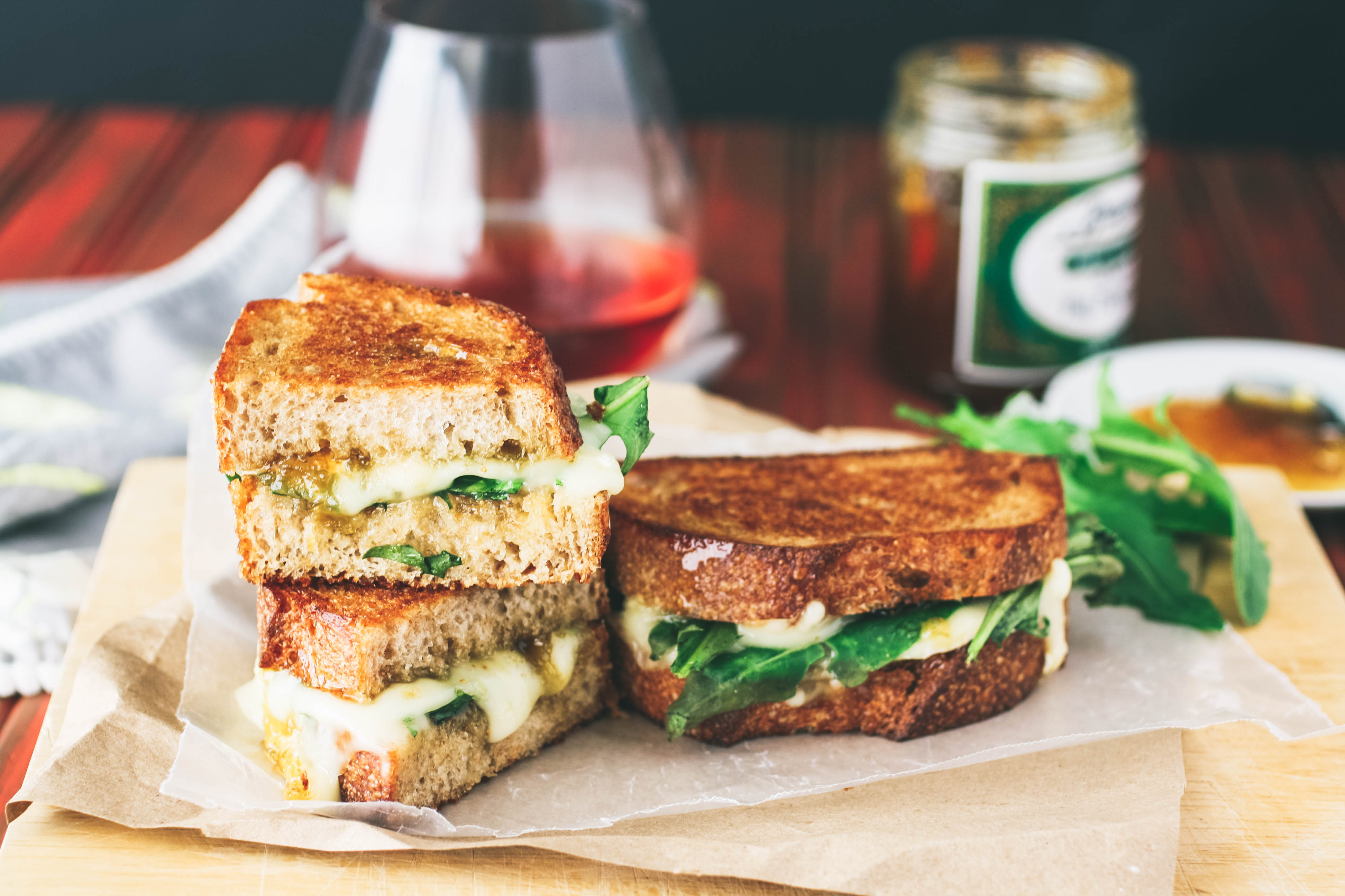 Grilled Brie, Fig Jam, and Dandelion Greens Sandwiches are a treat for when you need a uniquely different and delicious dish! Grilled Brie, Fig Jam, and Dandelion Greens Sandwiches make a fun and flavorful meal. 