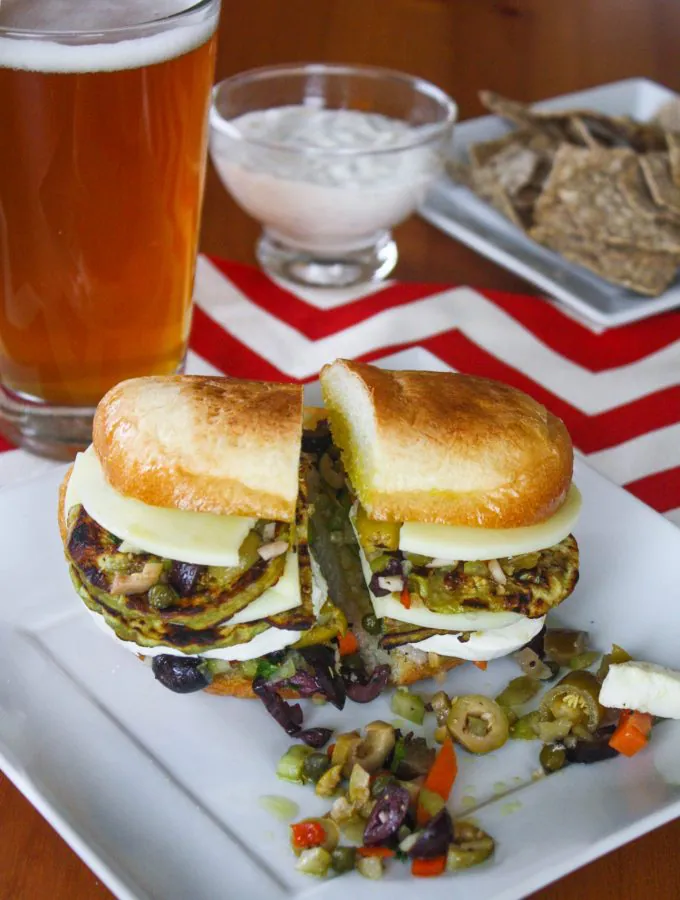 Eggplant Muffuletta Sandwiches are a meatless version of the classic. You'll love these vegetarian muffuletta sandwiches stuffed with eggplant.