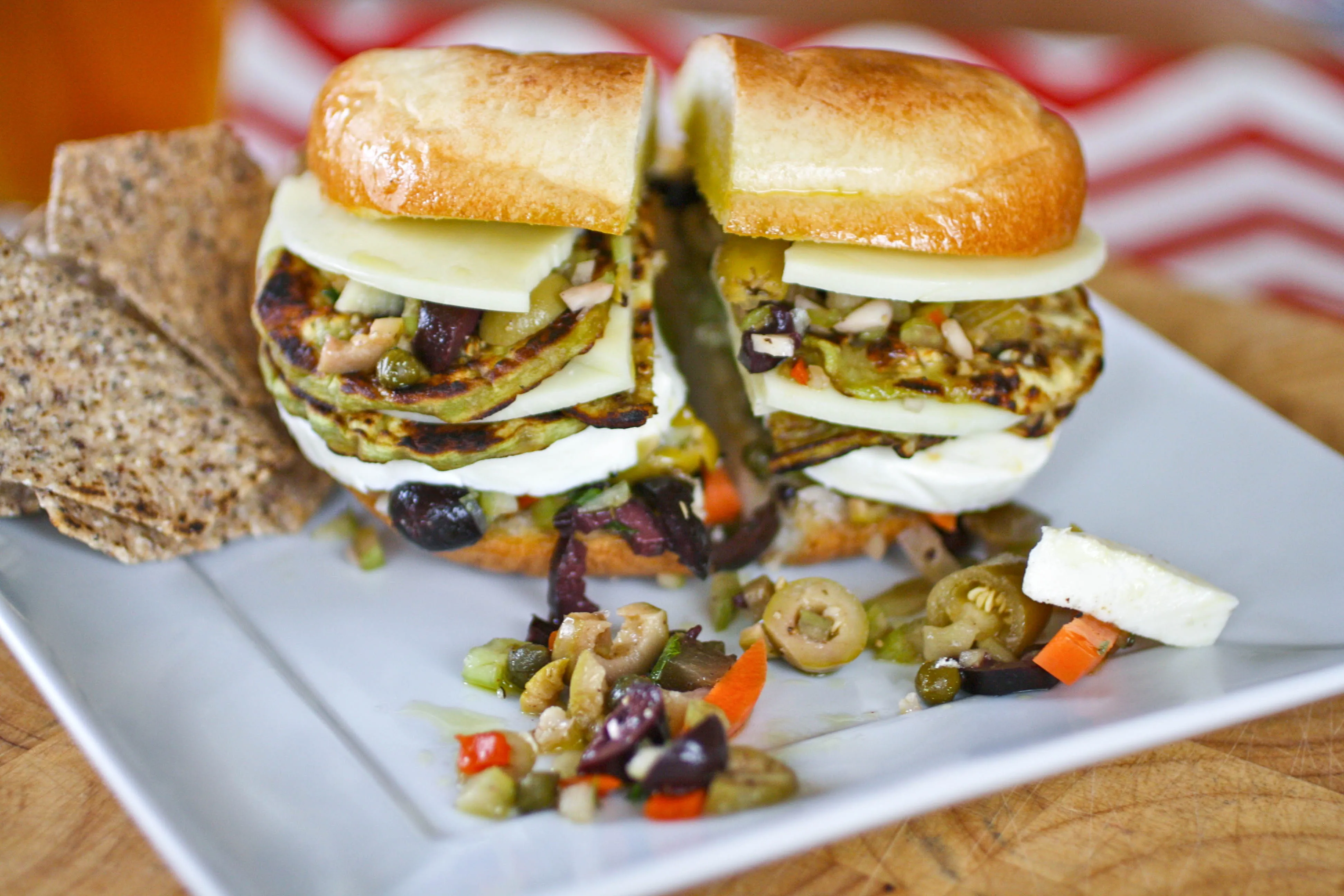 Eggplant Muffuletta Sandwiches are a meatless version of the classic. You'll love these eggplant muffuletta sandwiches for a hearty, meatless meal. 