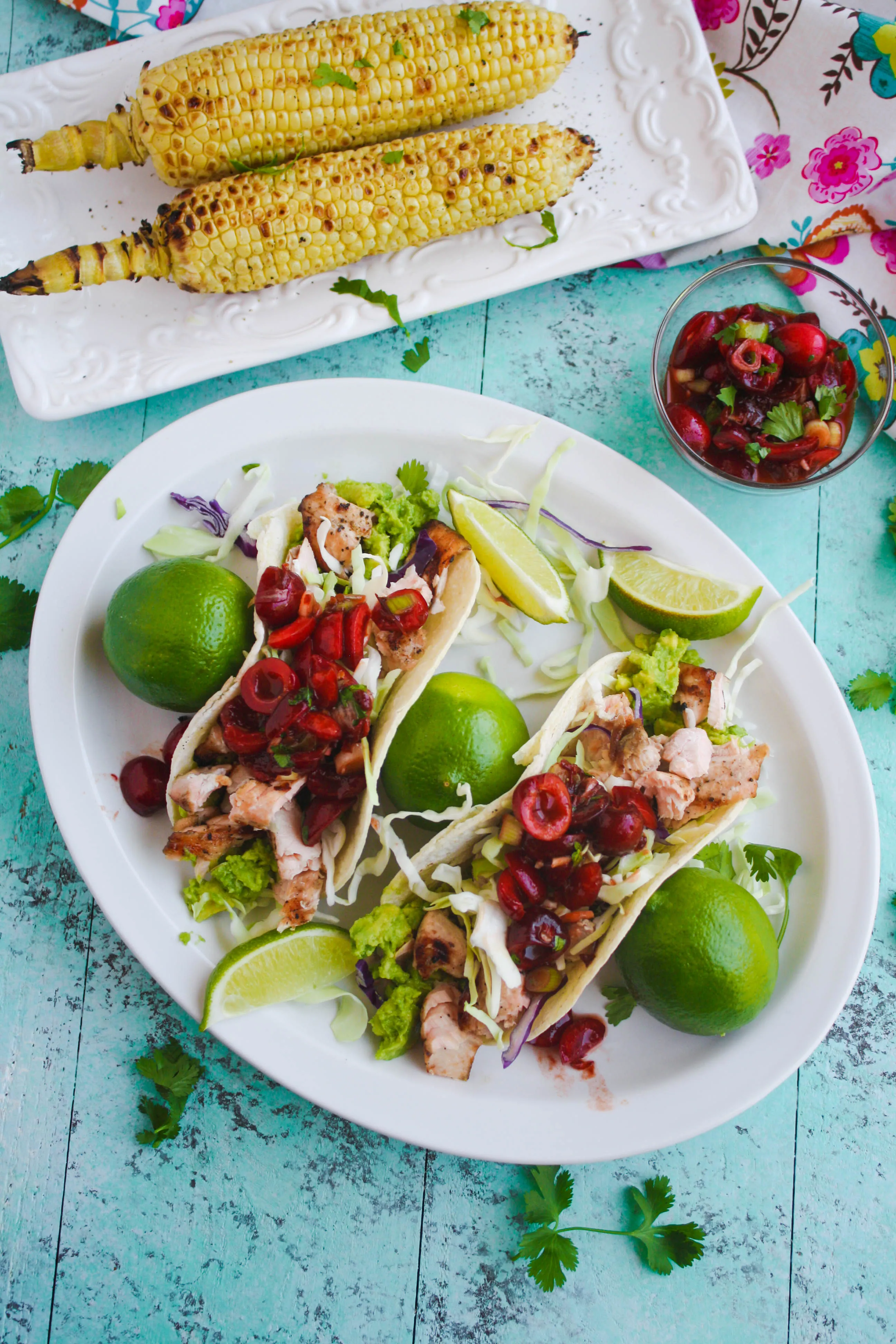 Grilled Salmon Tacos with Fresh Cherry-Chipotle Salsa is a perfect summer dish. Fresh cherries are perfect to top the salmon! Get your grill on!