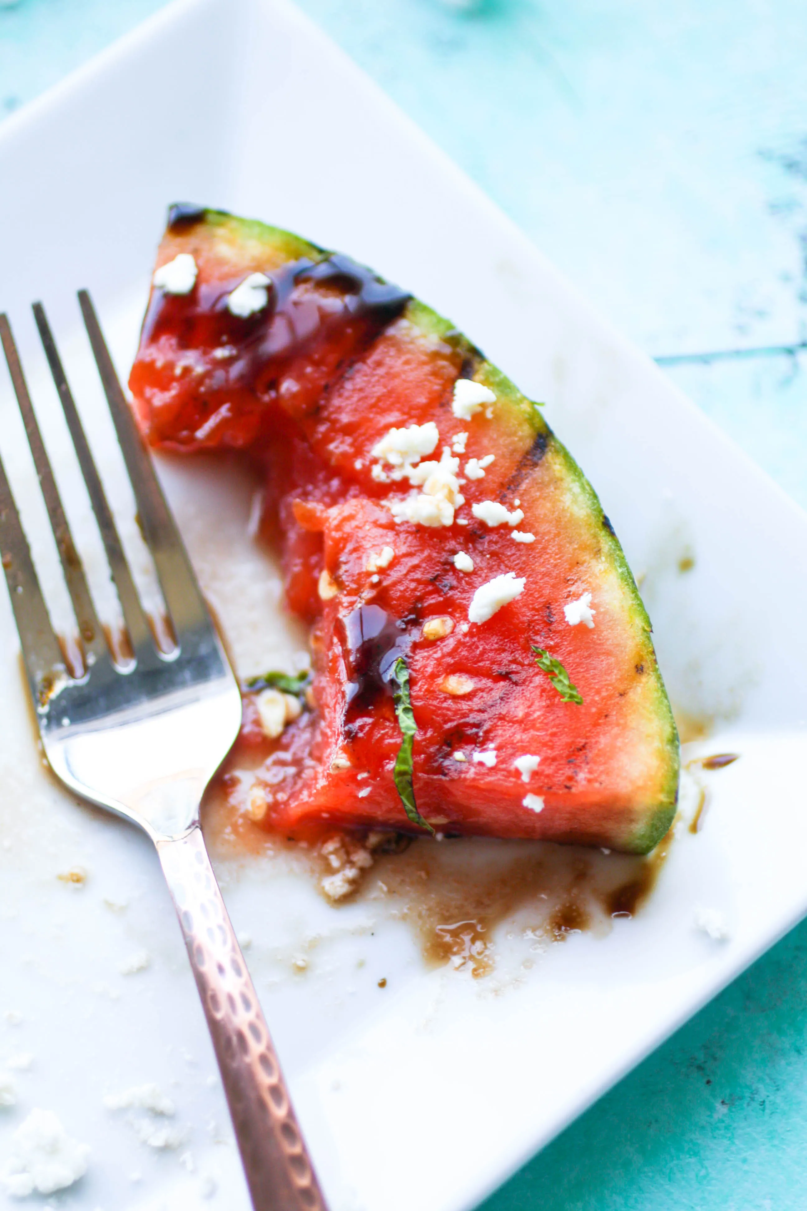 Grilled Watermelon with Feta, Mint, and Balsamic Glaze is a fresh way to start your next summer meal. Grilled Watermelon with Feta, Mint, and Balsamic Glaze is so easy to put together, and perfect for a summer get together!