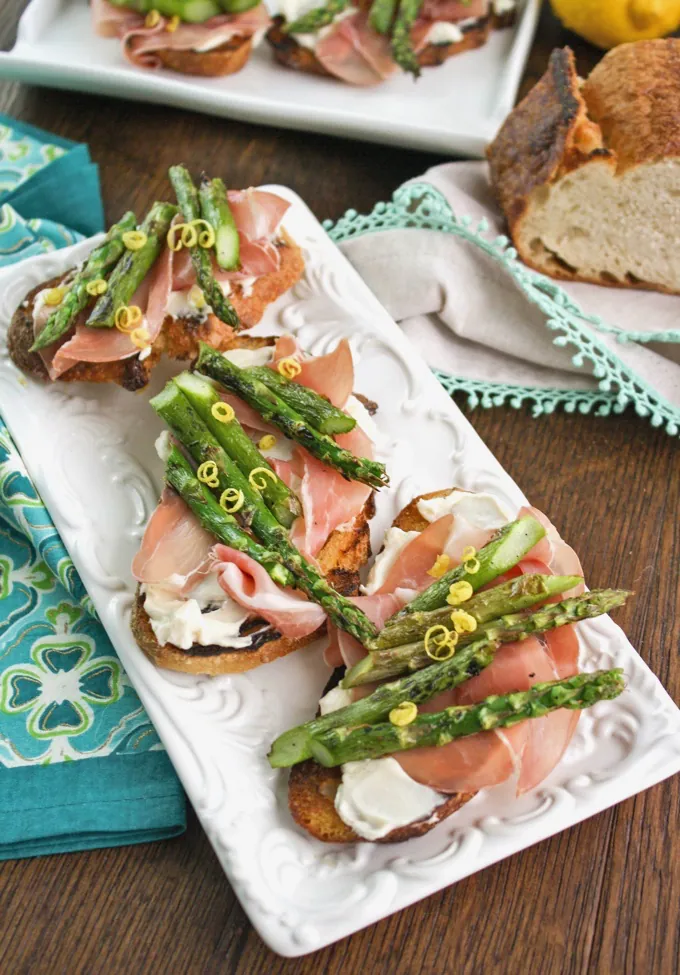 Grilled Asparagus, Prosciutto, and Brie Bruschetta is a lovely appetizer to snack on. Serve it anytime!