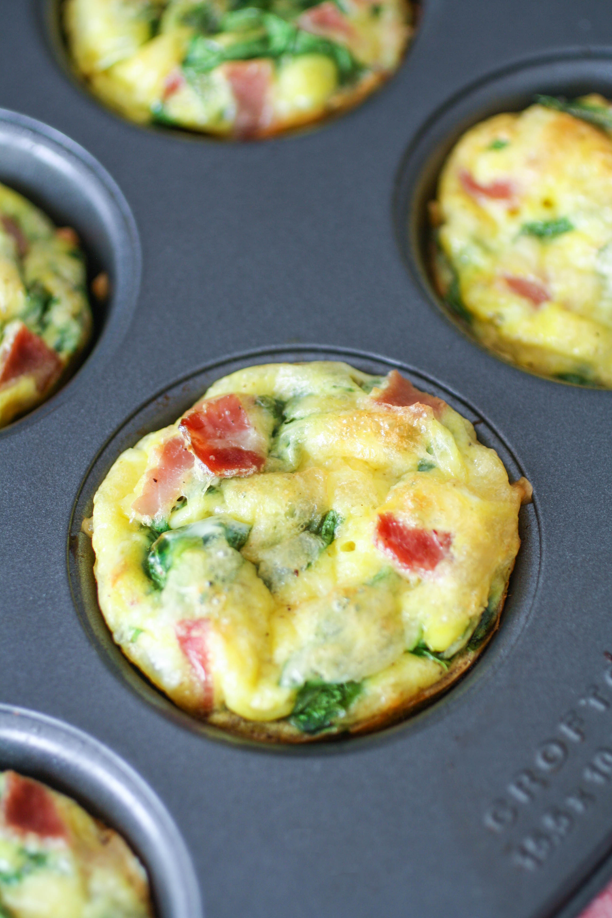Ham, Swiss, and Spinach Egg Muffin Cups are easy to make, and easy to customize for a great breakfast! Ham, Swiss, and Spinach Egg Muffin Cups are a delight for any meal!