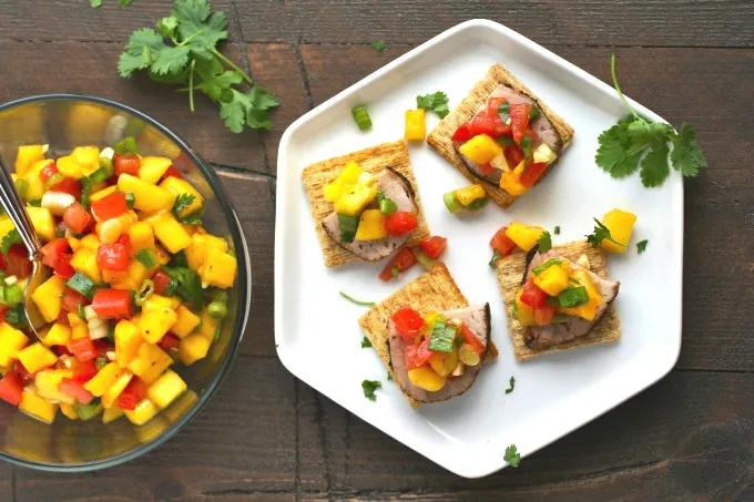 Pork Tenderloin Bites with Mango Salsa are amazing for any get together!