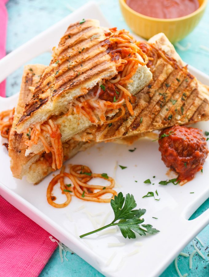 Leftover Spaghetti & Meatball Panini is a fun meal to use up last night's dinner! You'll love this dish that is so fun to serve!