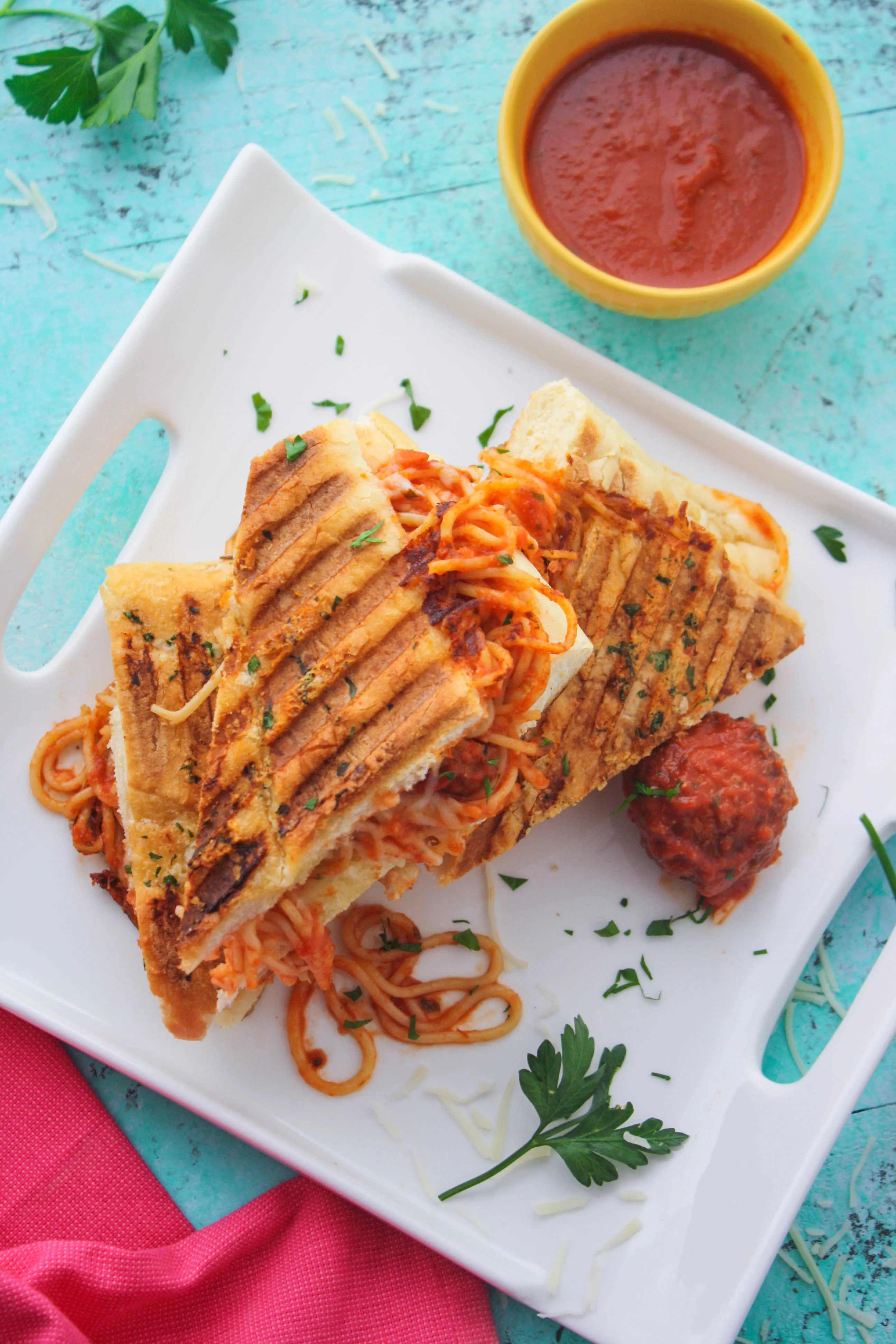 Leftover Spaghetti & Meatball Panini is a fun dish the whole family will enjoy! Leftovers get a fun makeover, for sure!