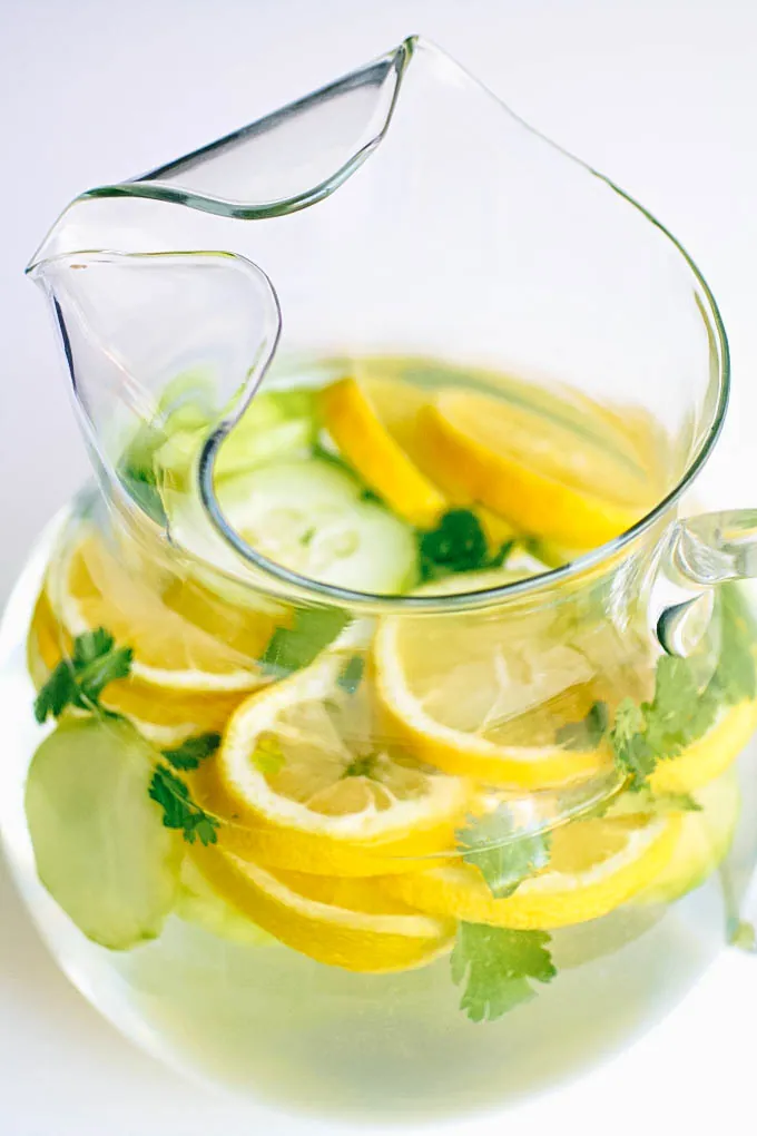 Lemon, Cucumber & Cilantro Infused Water is so refreshing! You'll love a big glass of Lemon, Cucumber & Cilantro Infused Water!