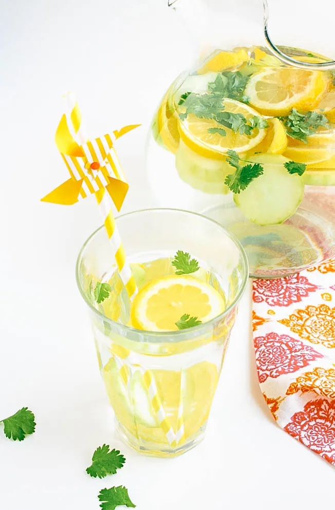 Lemon, Cucumber & Cilantro Infused Water is a drink to keep on hand all season. Lemon, Cucumber & Cilantro Infused Water is refreshing anytime of year.