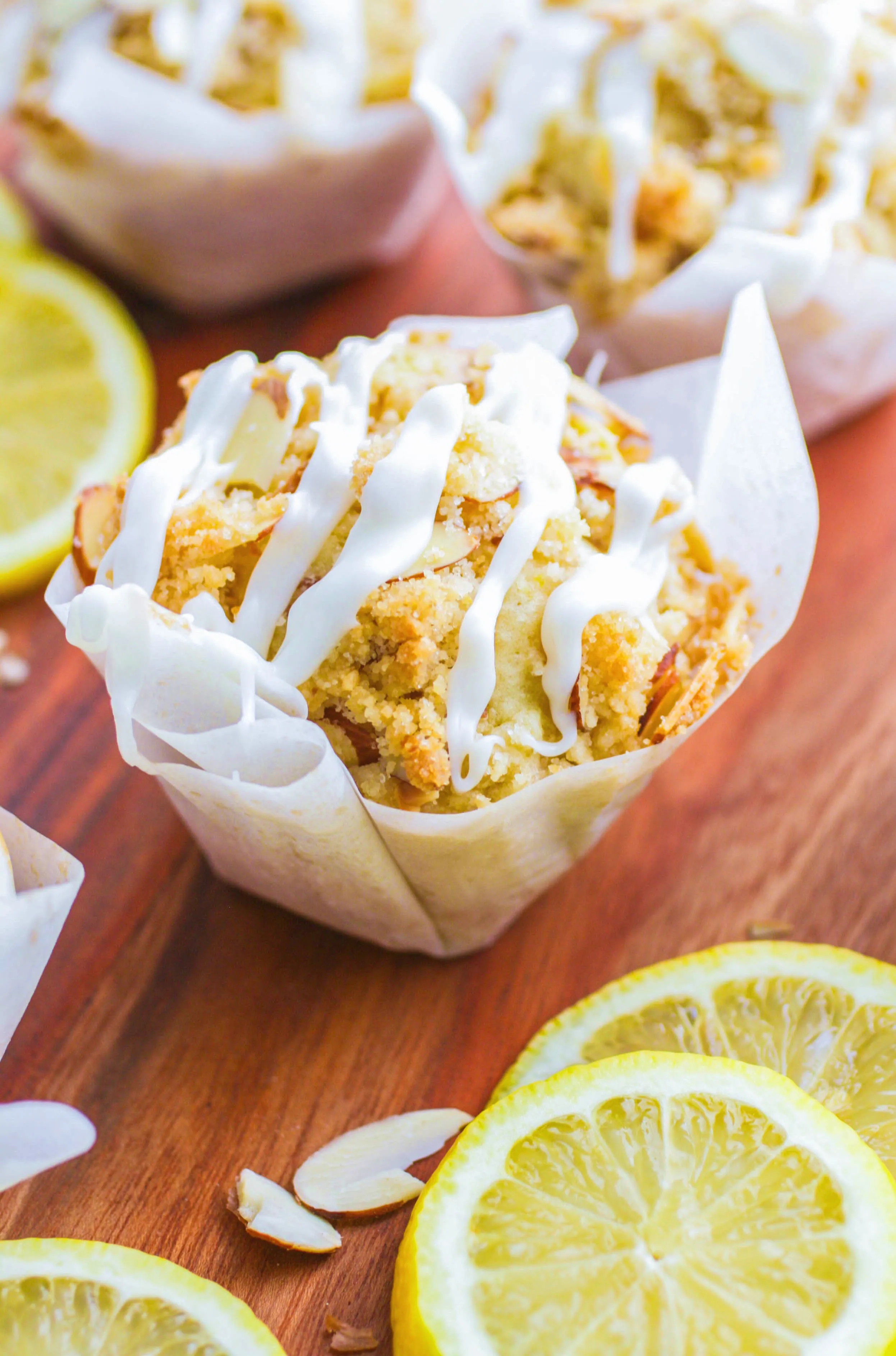 Lemon Muffins with Almond Streusel and Glaze are the perfect morning treat! These lemon muffins are delightful!
