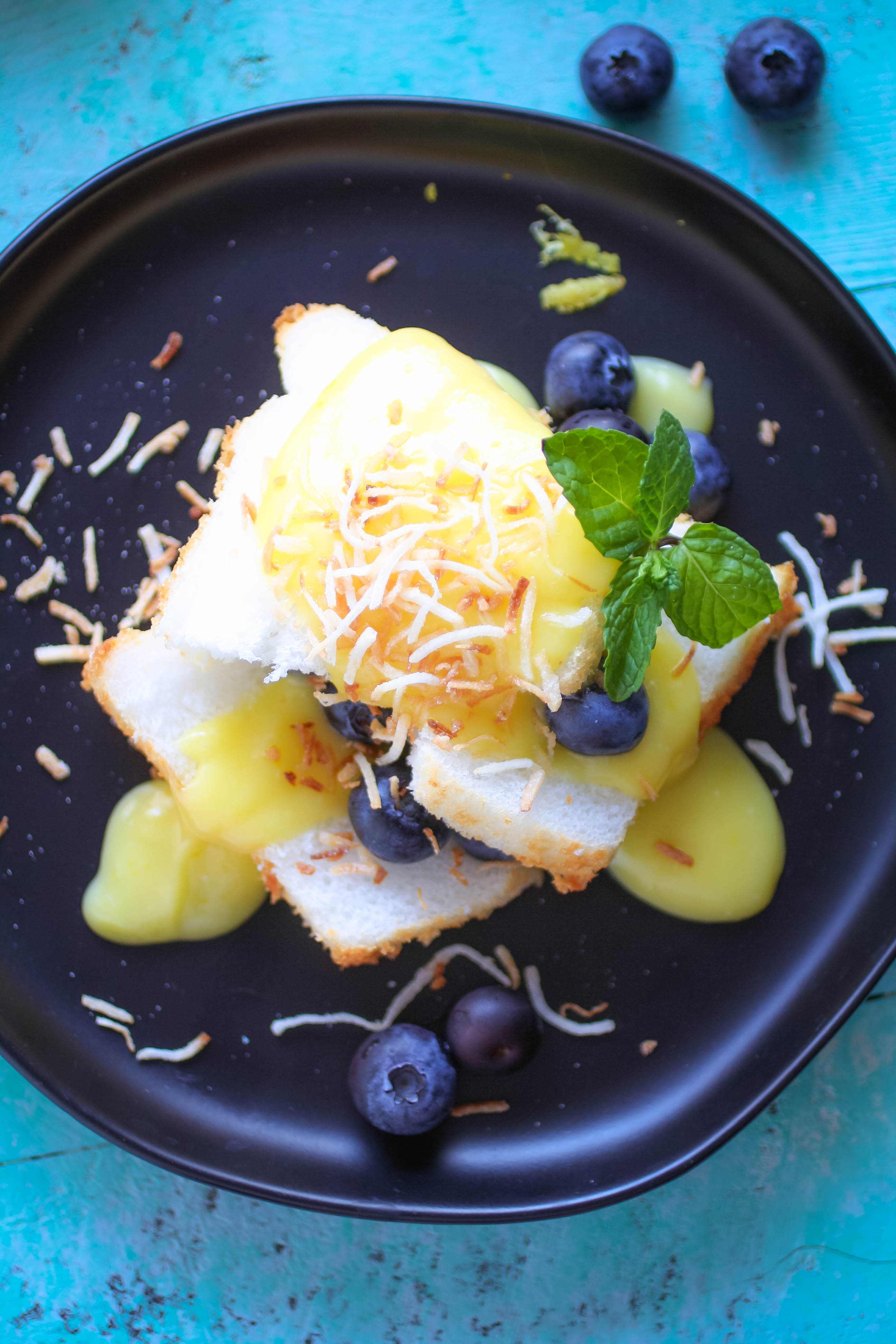 Lemon Curd Layered with Angel Food Cake and Blueberries is a dessert that will brighten your day.