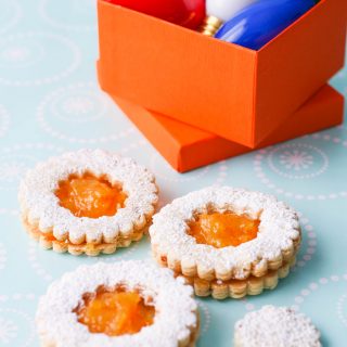 Linzer Cookies with Homemade Orange Marmalade are the perfect holiday cookies! You'll love these Linzer cookies with homemade orange marmalade -- they're delicious and pretty!