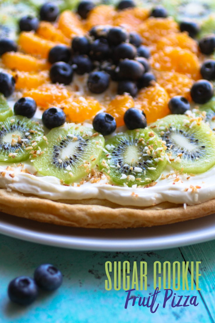 Sugar Cookie Dessert Pizza will be the perfect treat for summertime parties! Sugar Cookie Dessert Pizza is easy to make and so tasty for an easy, pretty dessert!