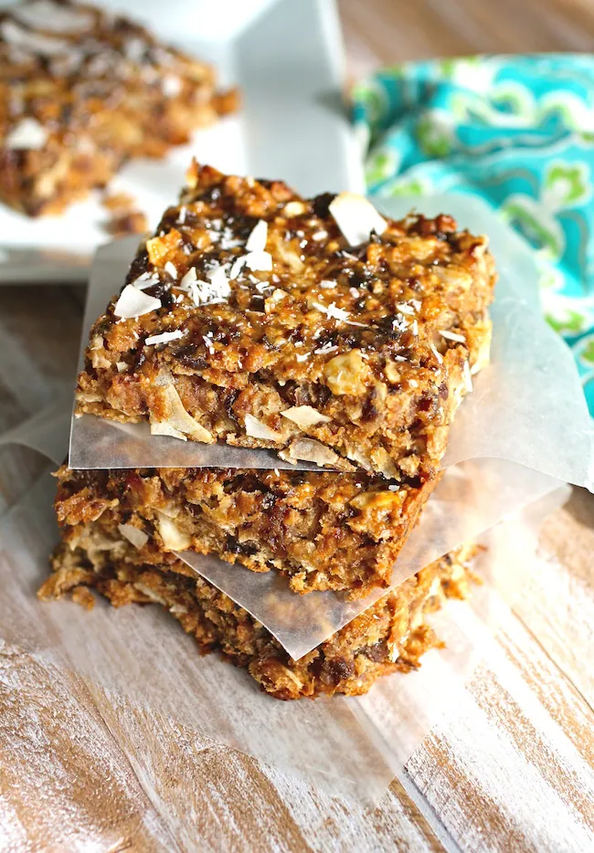 Chewy Coconut and Dried Fruit Bars are a super-tasty treat with a healthy vibe. You'll love these chewy fruit and coconut bars!