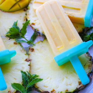 Mango-Pineapple Creamsicles are frosty and tasty for an ideal summer cool-down treat!