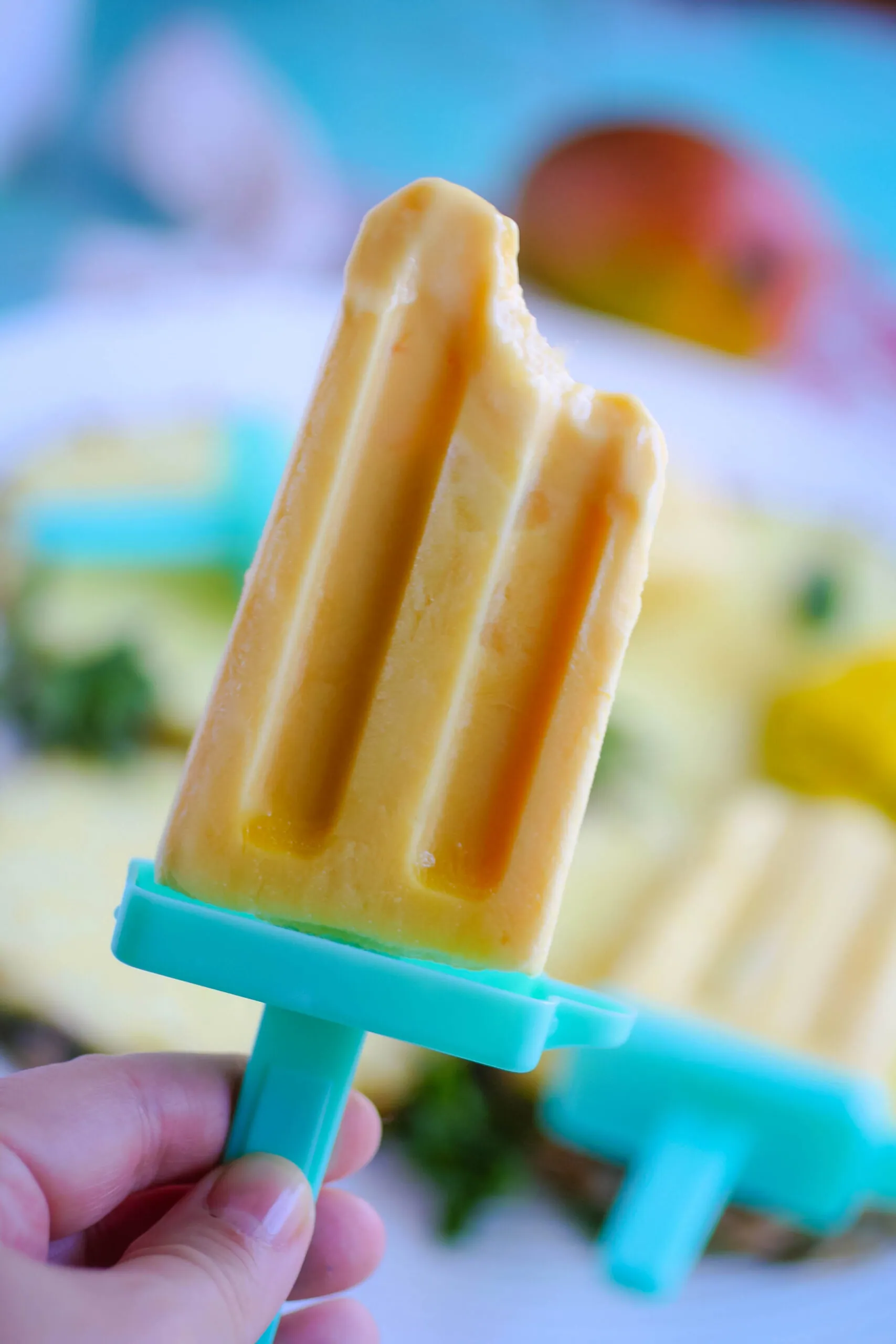 Mango-Pineapple Creamsicles help take the edge off the summer heat, with big flavor!