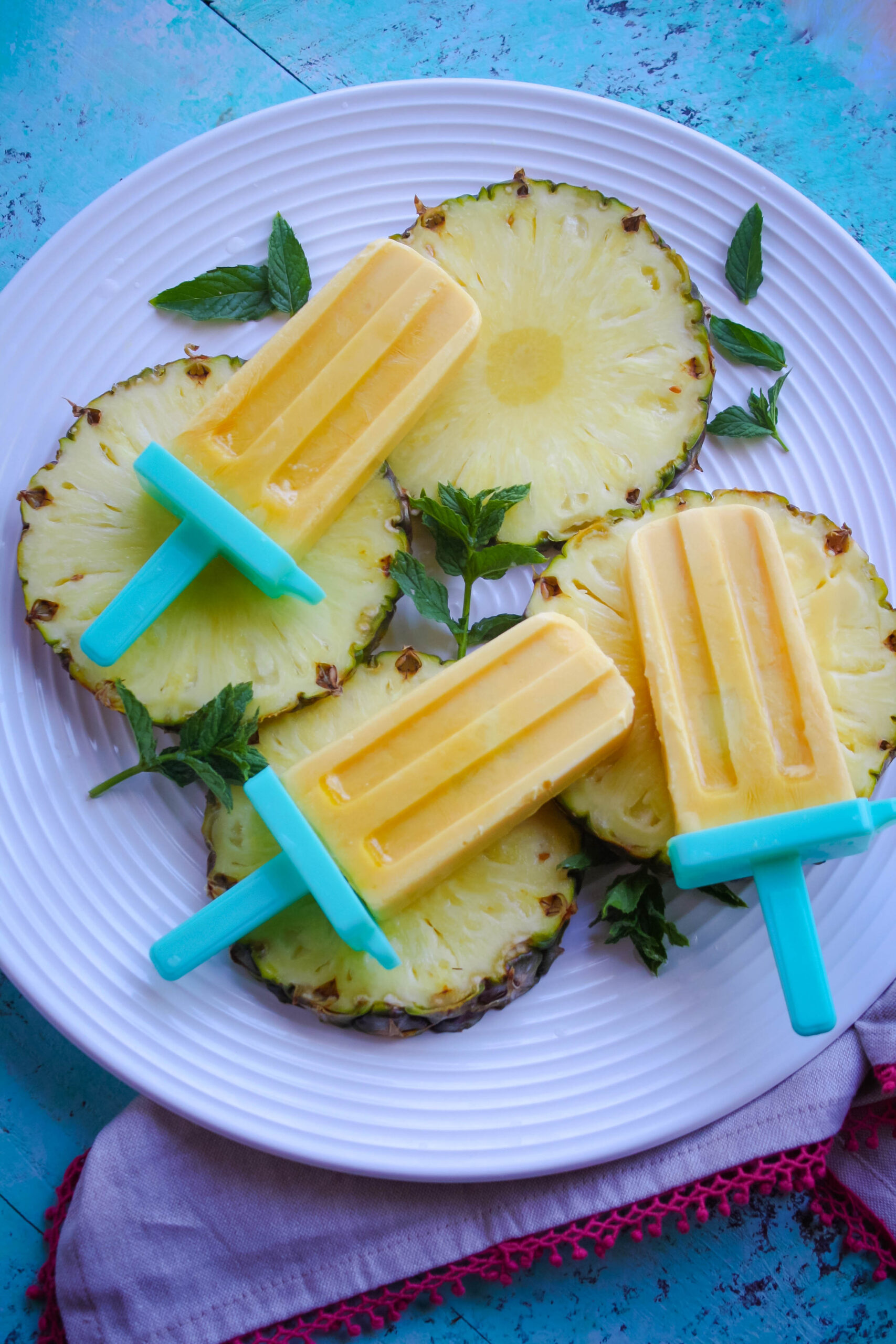 Mango-Pineapple Creamsicles are so yummy and perfect for the summer.