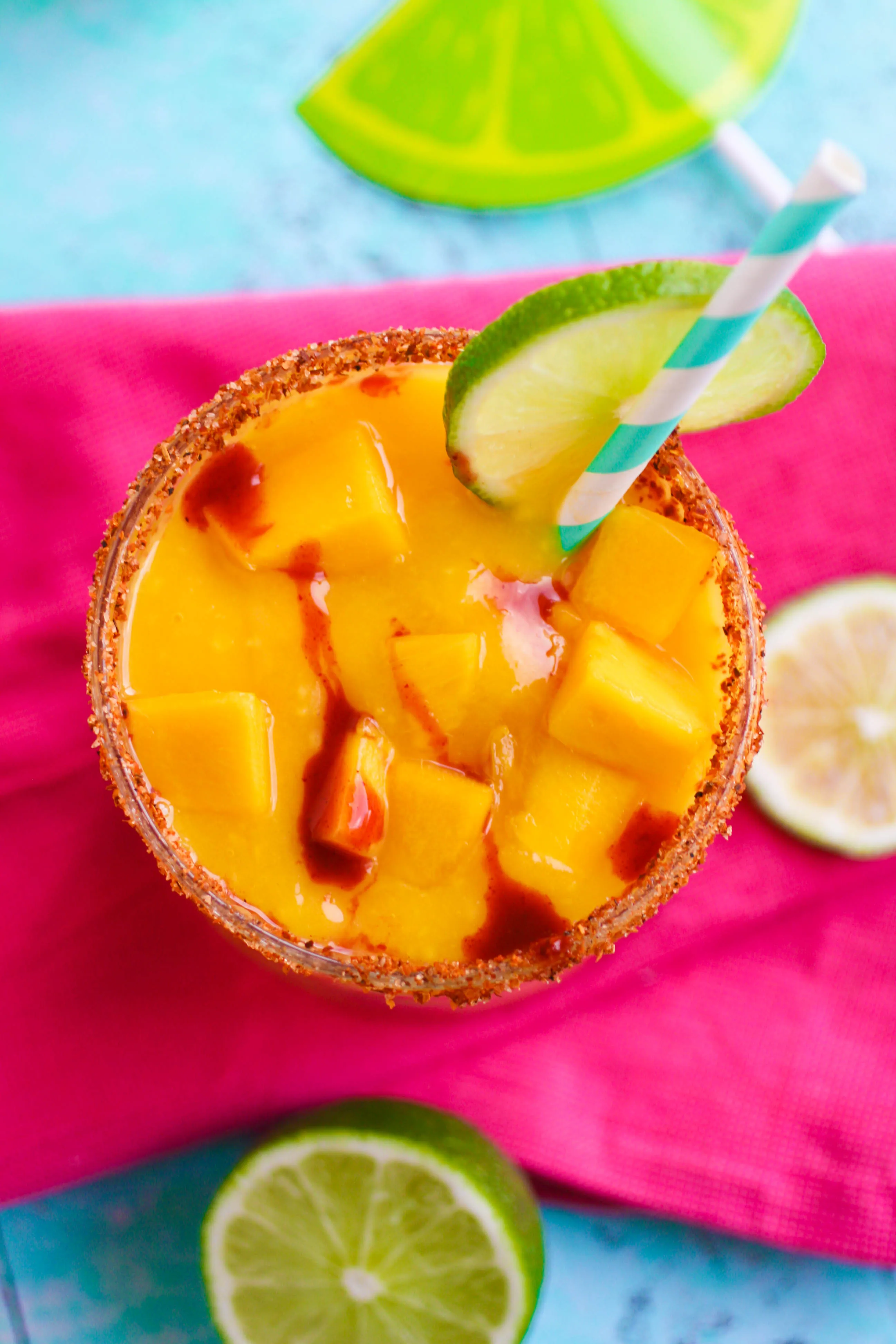 Mangonada Margaritas are colorful and flavorful on a summer day! Mangonada Margaritas are fresh and flavorful for a summer drink.