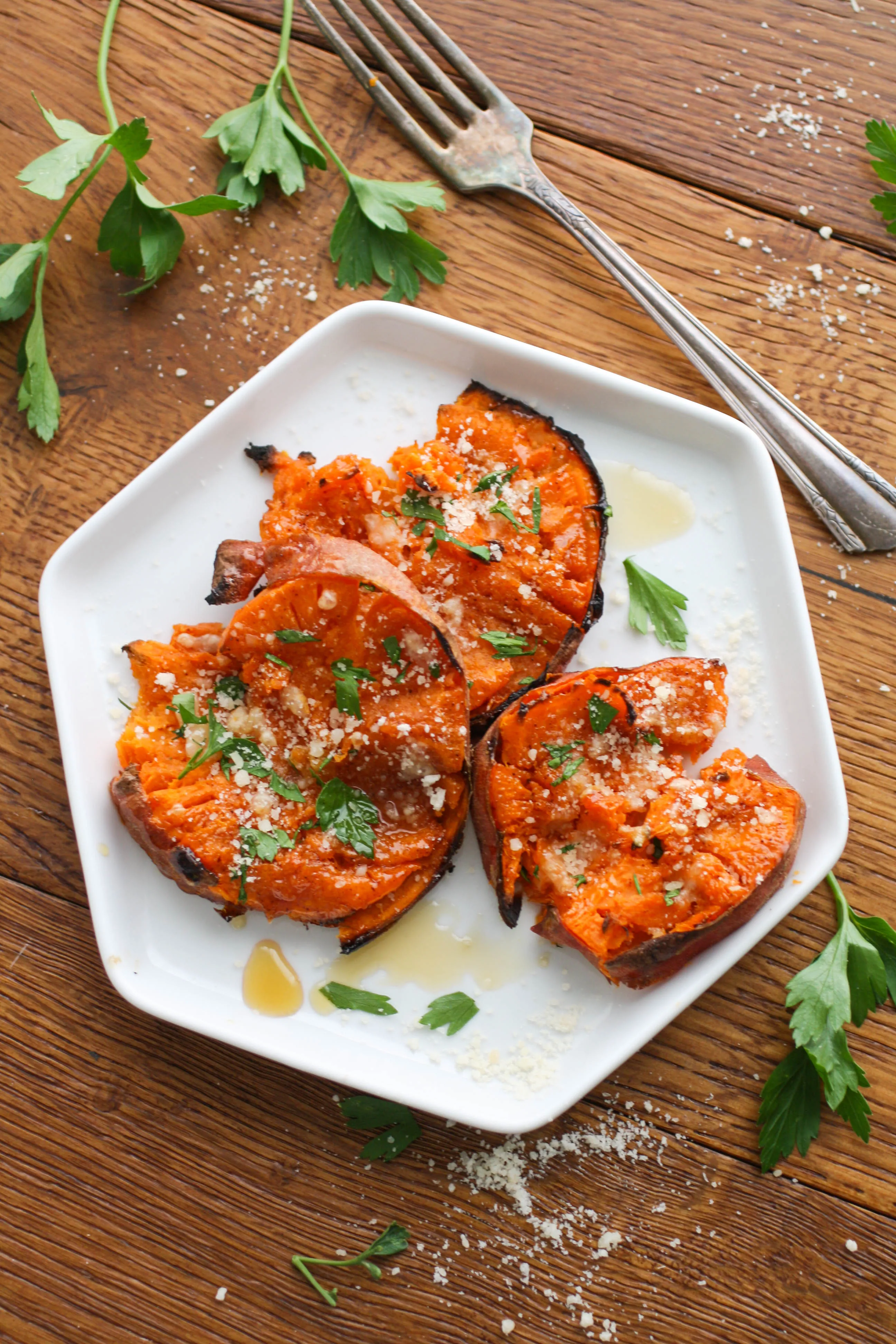 Maple Chipotle Parmesan Smashed Sweet Potatoes are a delicious side dish. You'll love that these potatoes are an easy-to-make side dish!