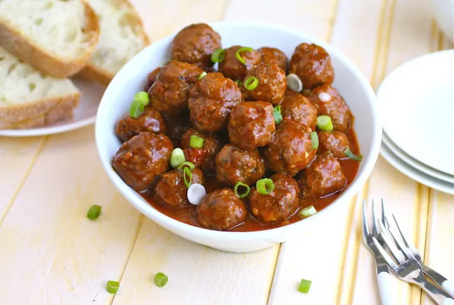 Spanish-style Meatballs garnished with green onion