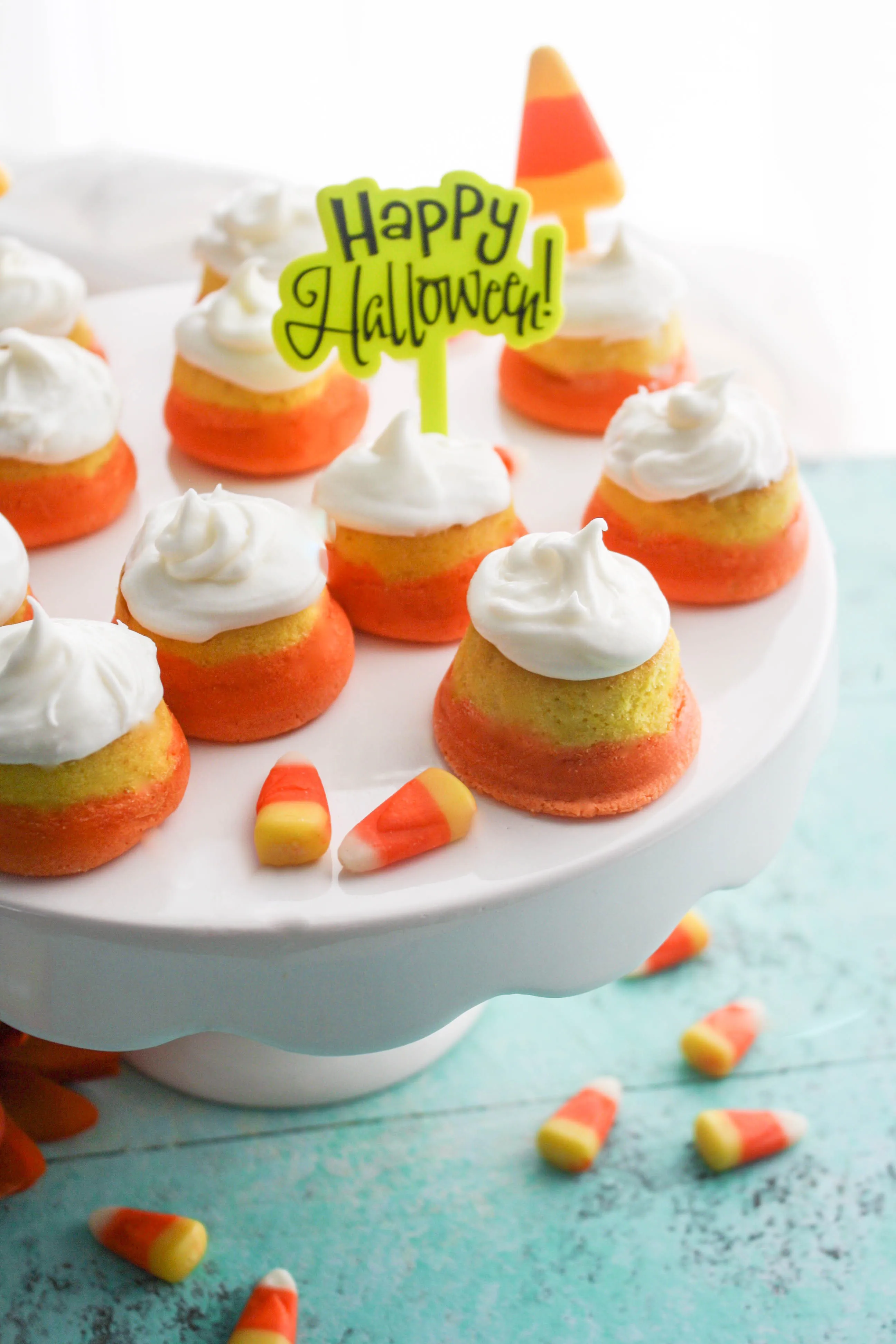 Mini “Candy Corn” Cupcakes with Buttercream Frosting make the perfect Halloween dessert! These mini cupcakes are fabulous for the Halloween festivities!