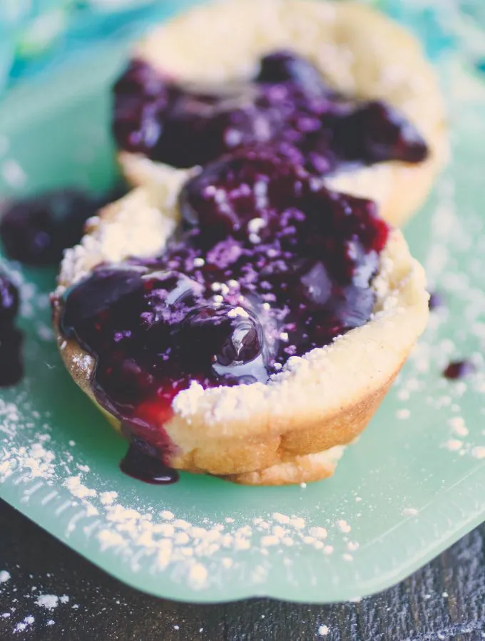 Mini Dutch Baby Pancakes with Berry Compote are lovely little breakfast treats. Mini Dutch Baby Pancakes with Berry Compote are lovely in the morning.