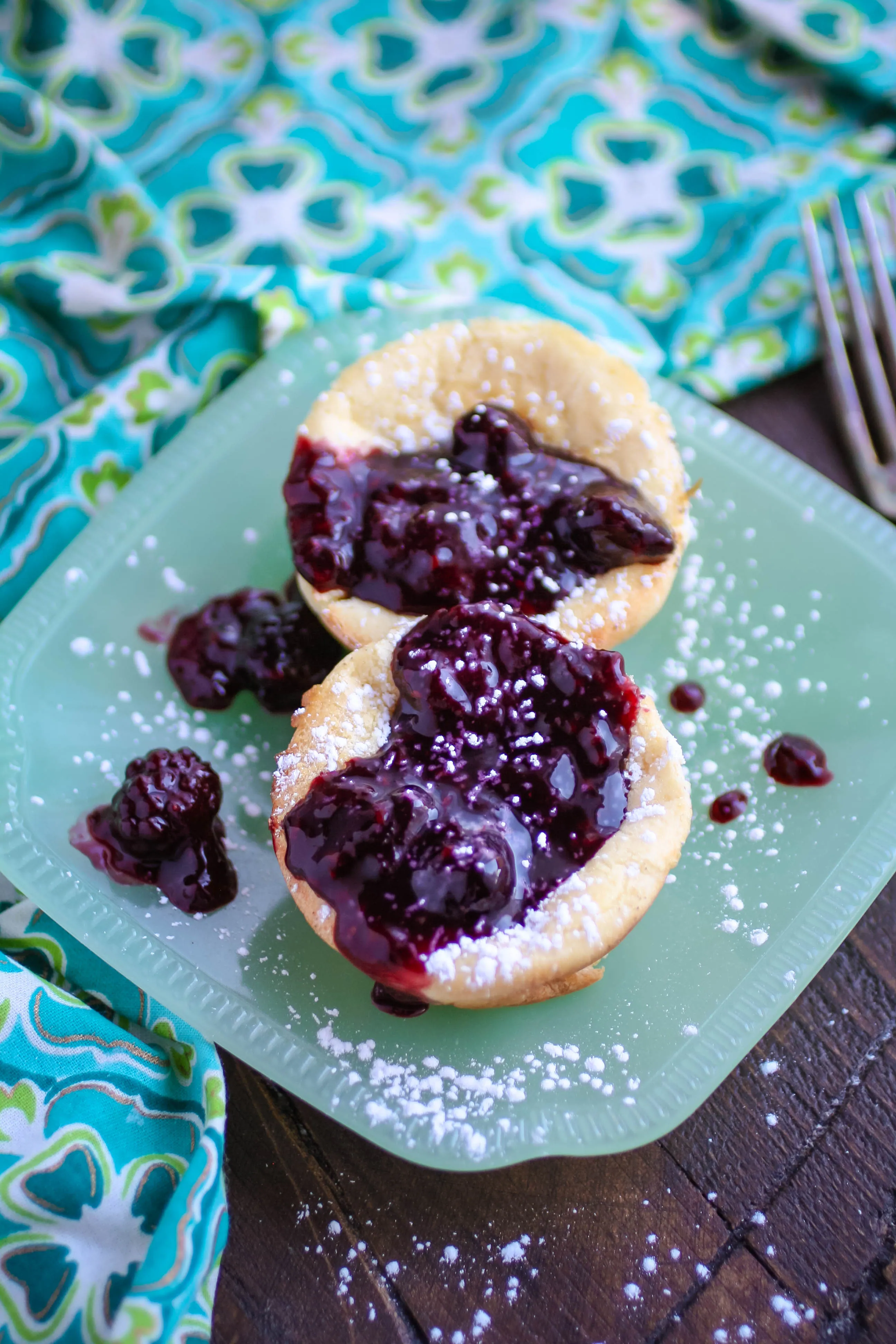 Mini Dutch Baby Pancakes with Berry Compote make a morning meal special. Mini Dutch Baby Pancakes with Berry Compote are lovely for breakfast or brunch.