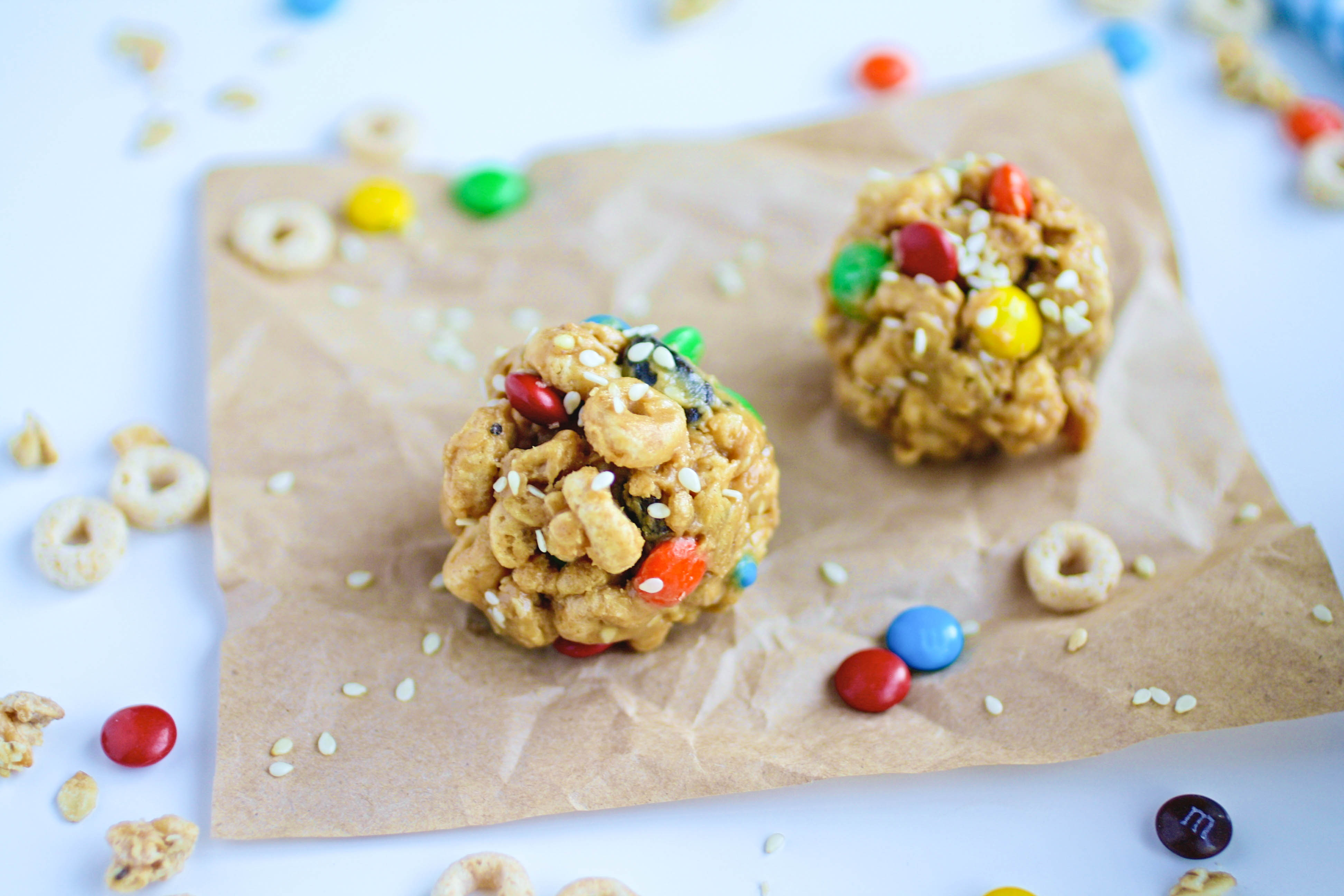 No-Bake Monster Cereal Bites taste the best with friends! These snacks are so fun and easy to make!