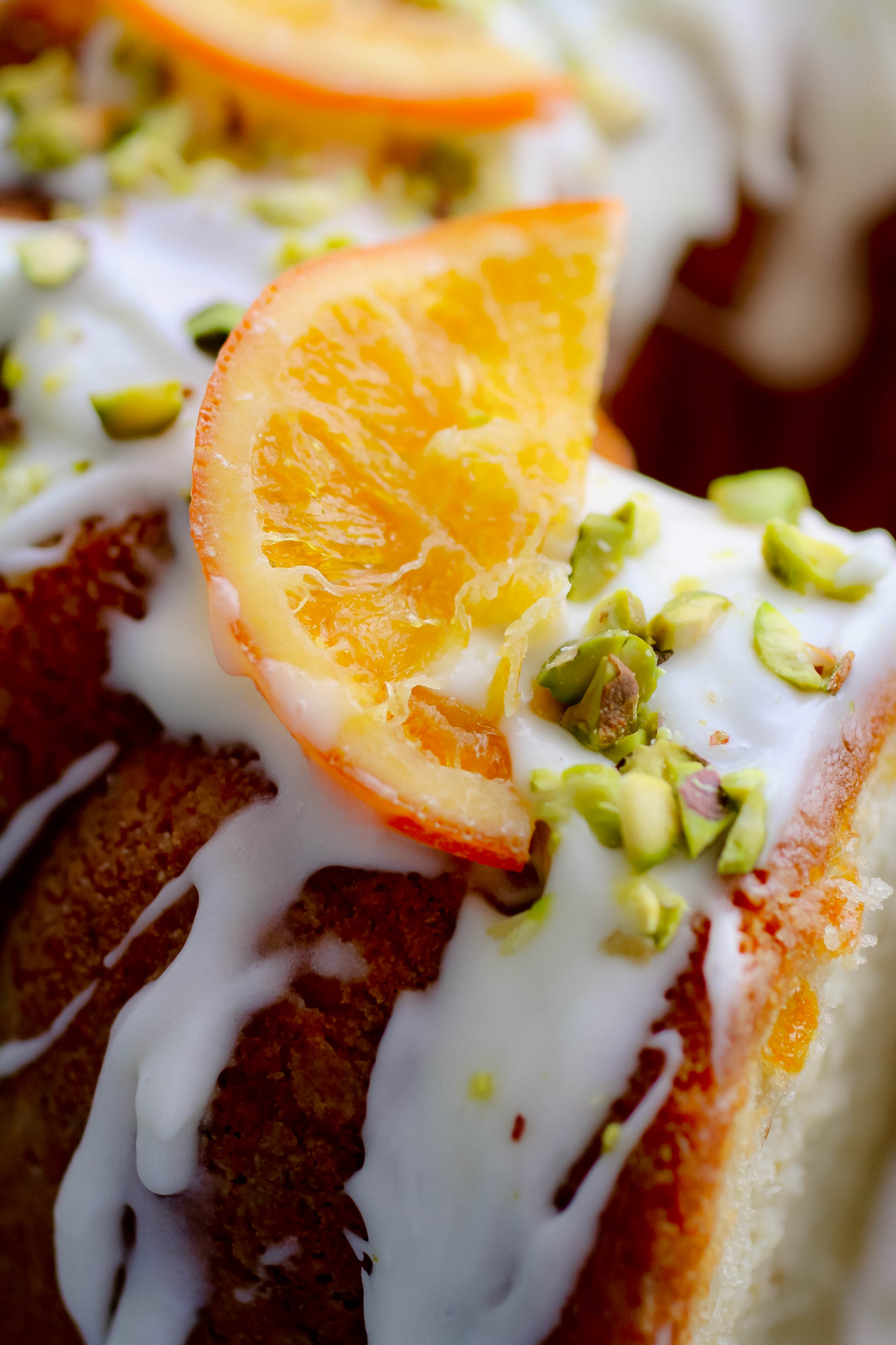Orange Marmalade-Pistachio Bundt Cake is so pretty, and perfect for any spring holiday or occasion. You'll adore this festive Orange Marmalade-Pistachio Bundt Cake.